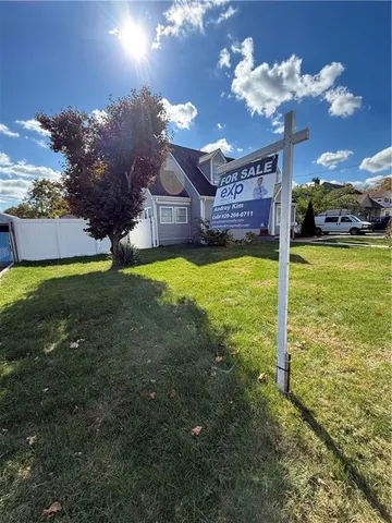 a view of a house with a big yard