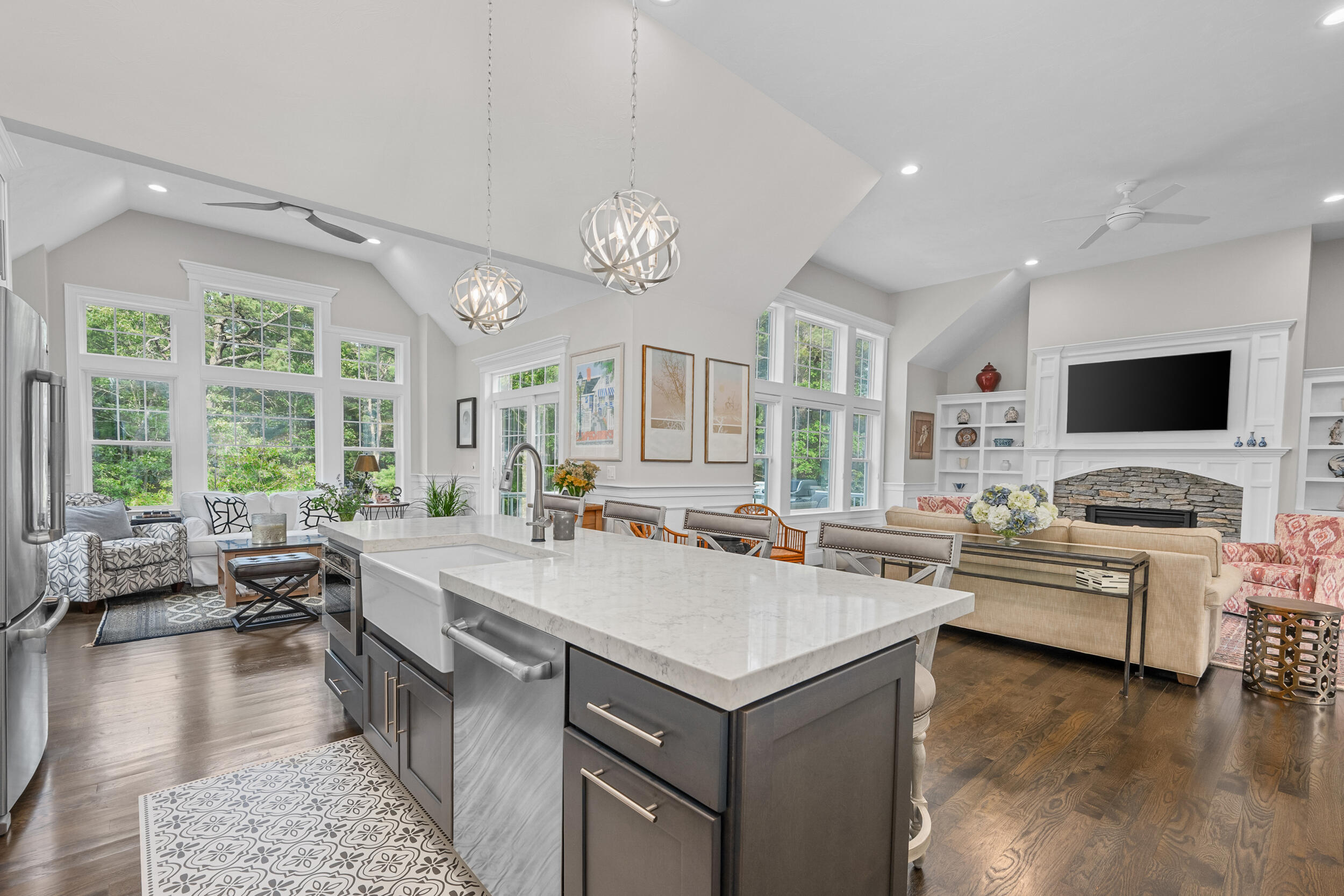 22 Camden Lane Mashpee, MA 02649 - Photo 11 of 46 a large kitchen with kitchen island a large island in it