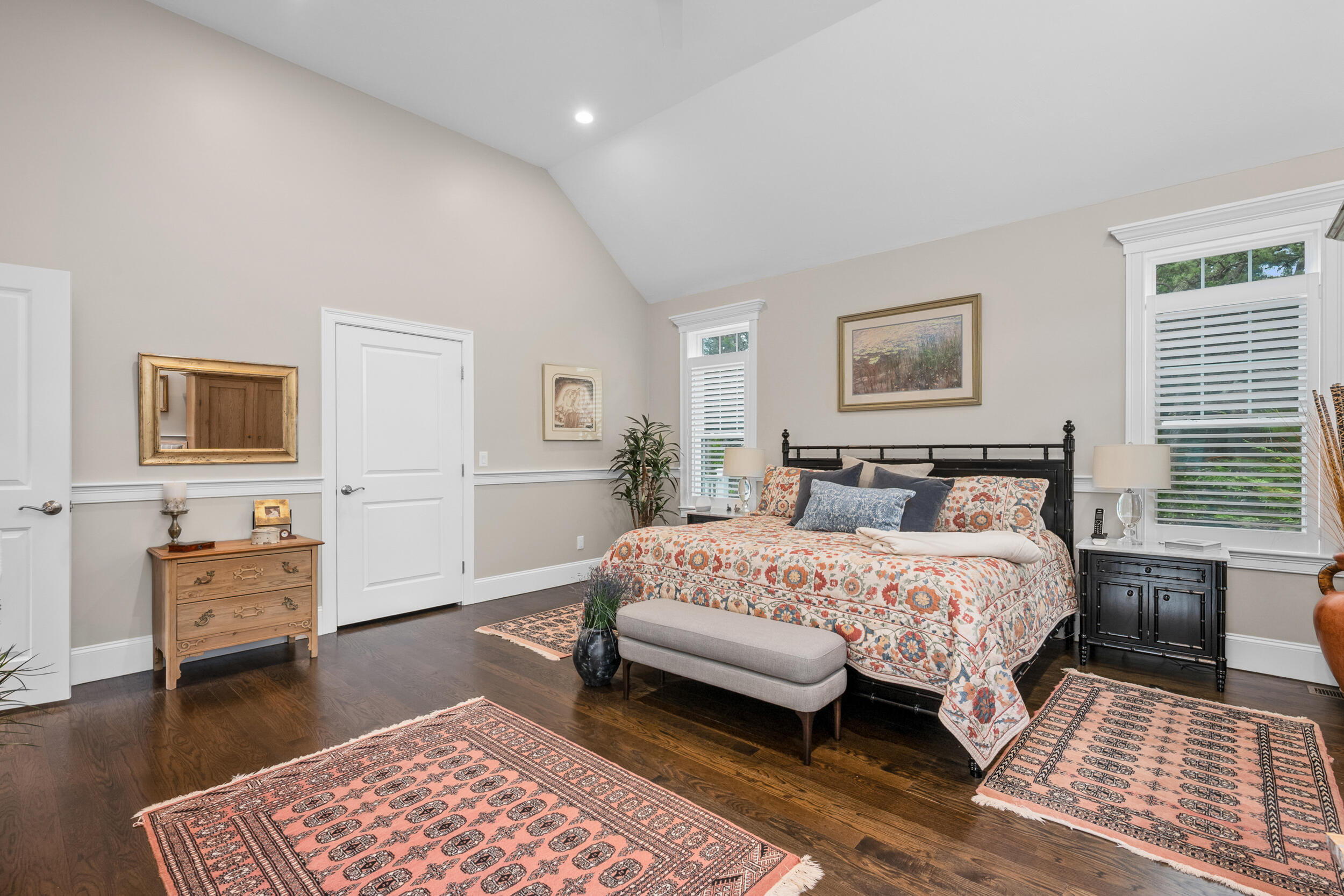 22 Camden Lane Mashpee, MA 02649 - Photo 22 of 46 a bedroom with a bed a dresser and chair