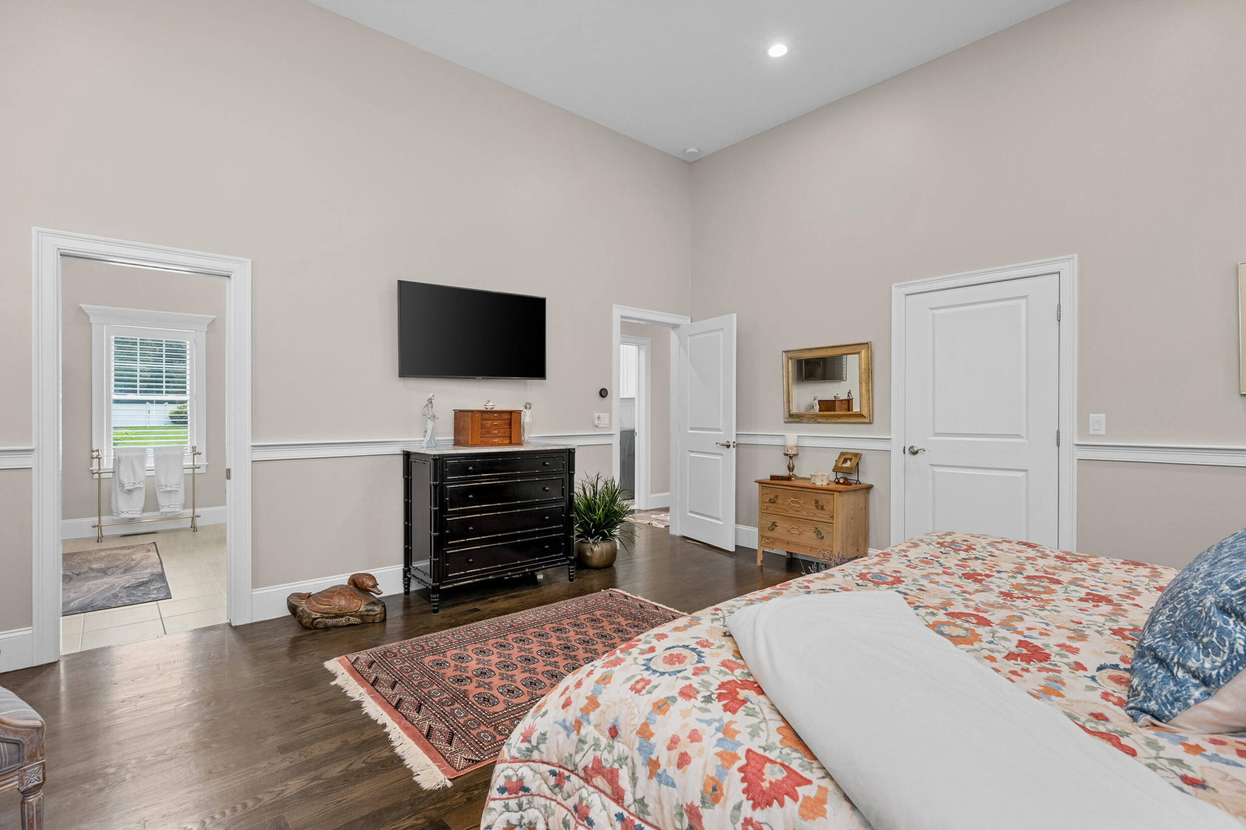 22 Camden Lane Mashpee, MA 02649 - Photo 23 of 46 a bedroom with furniture and a flat screen tv