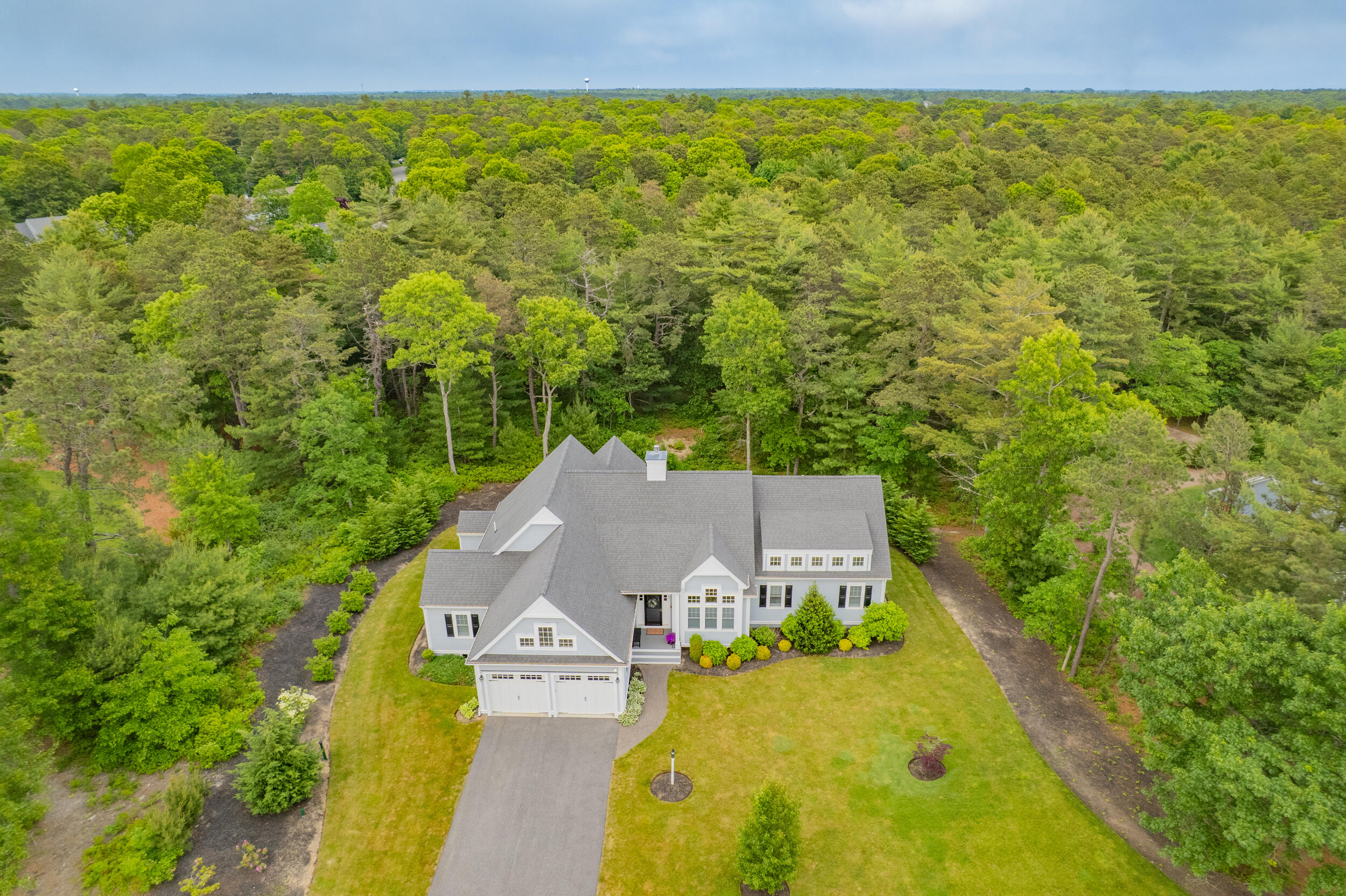 22 Camden Lane Mashpee, MA 02649 - Photo 34 of 46 an aerial view of a house with swimming pool and garden