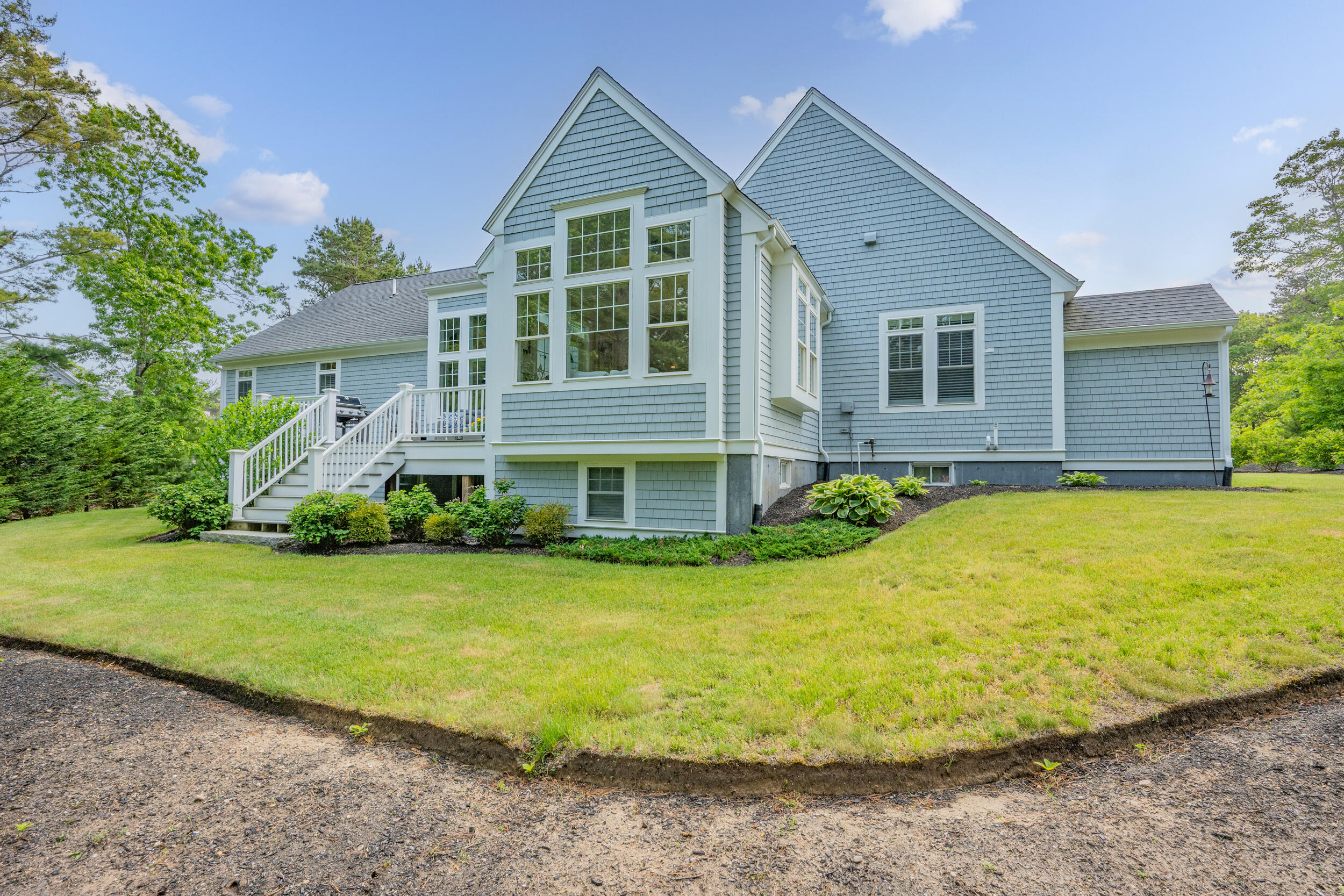 22 Camden Lane Mashpee, MA 02649 - Photo 36 of 46 a view of a house with a yard