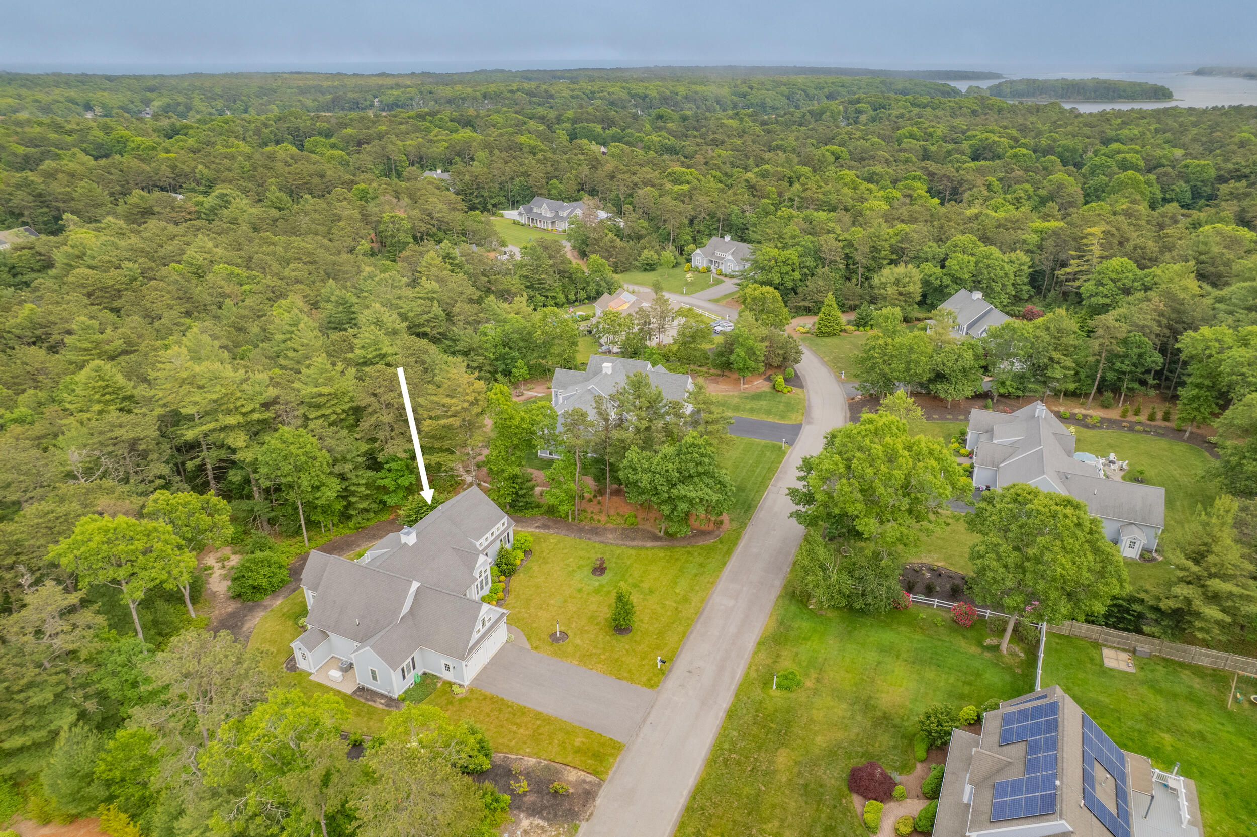 22 Camden Lane Mashpee, MA 02649 - Photo 4 of 46 an aerial view of residential houses with outdoor space and swimming pool