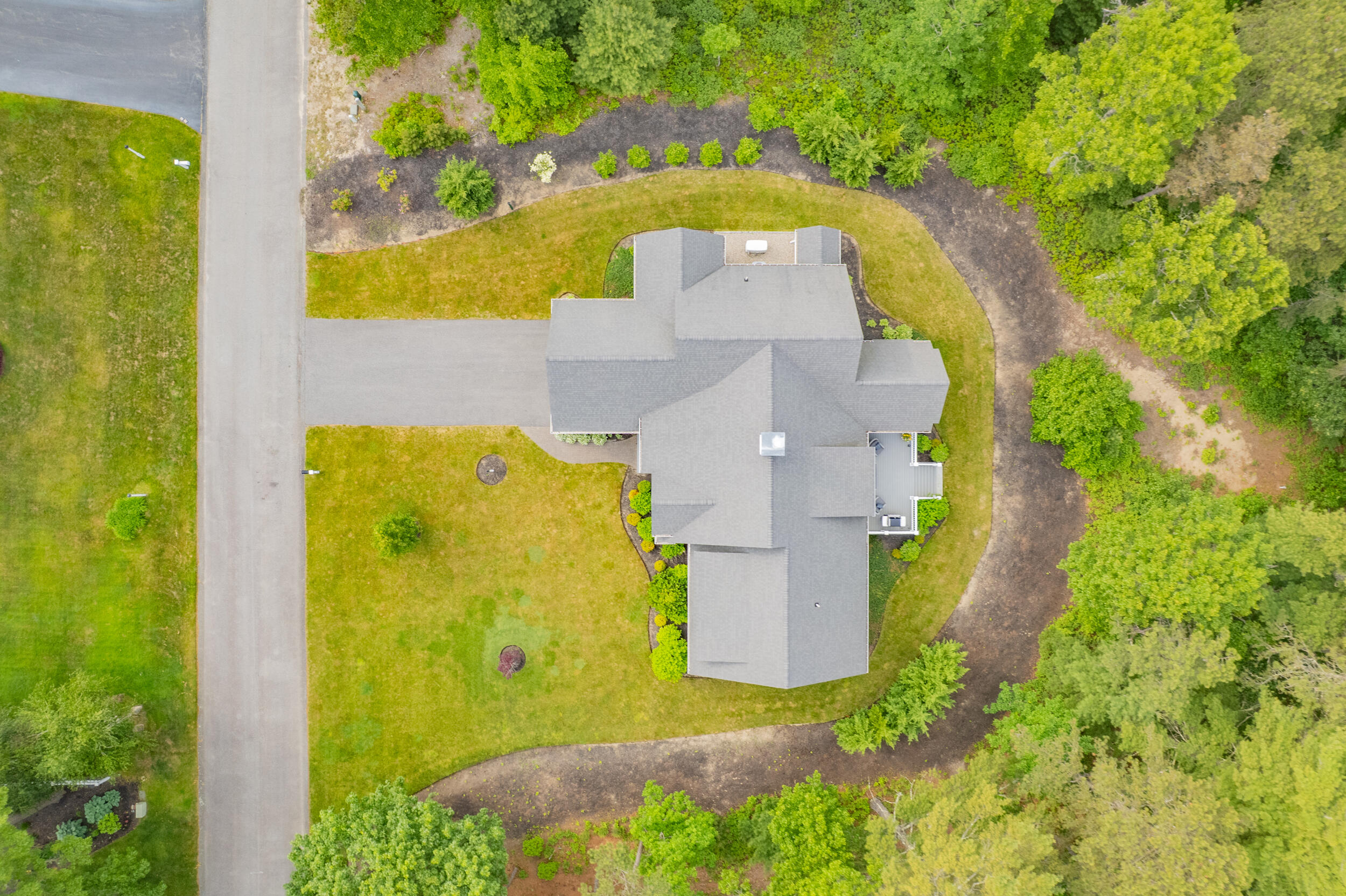 22 Camden Lane Mashpee, MA 02649 - Photo 44 of 46 an aerial view of a house with swimming pool