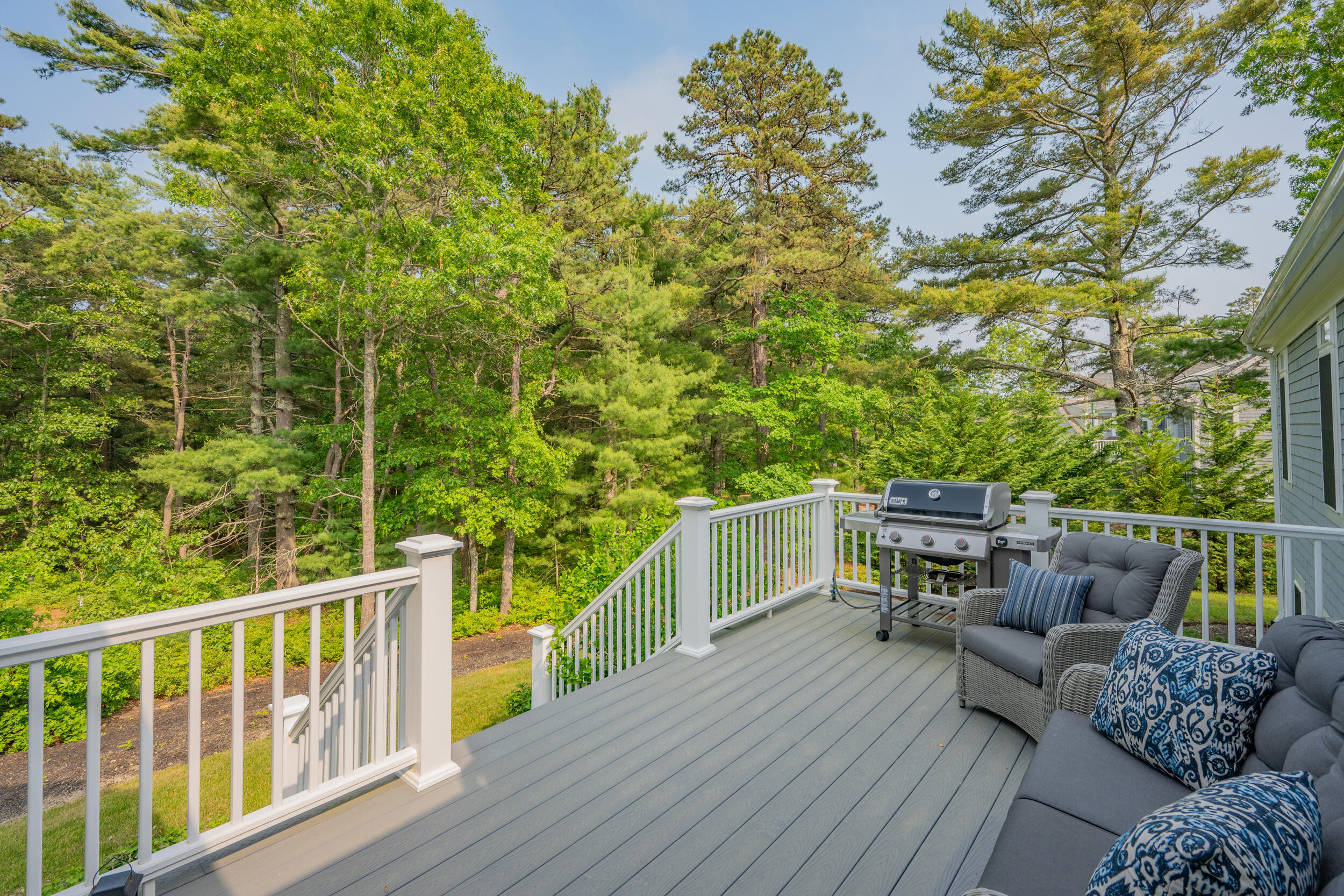 22 Camden Lane Mashpee, MA 02649 - Photo 6 of 46 a balcony with furniture and wooden deck