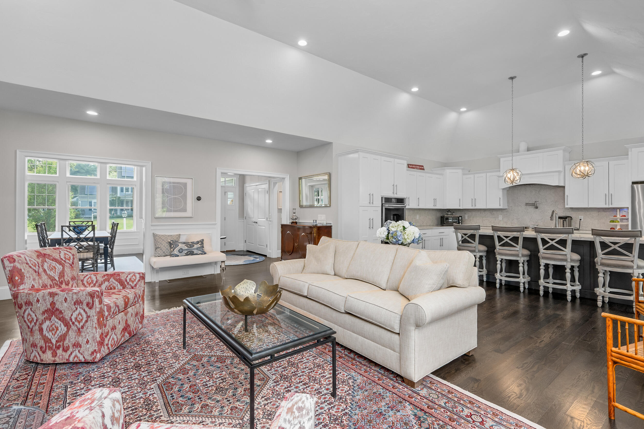 22 Camden Lane Mashpee, MA 02649 - Photo 10 of 46 a living room with furniture kitchen view and a large window