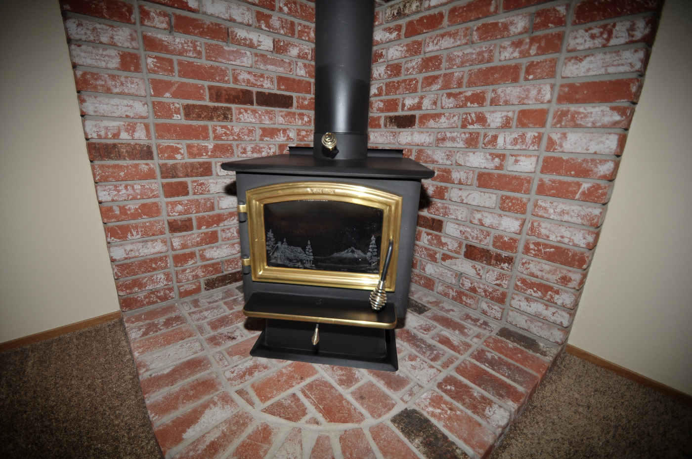 2867 Camulos Way Redding, CA 96002 - Photo 4 of 13 a living room with a fireplace
