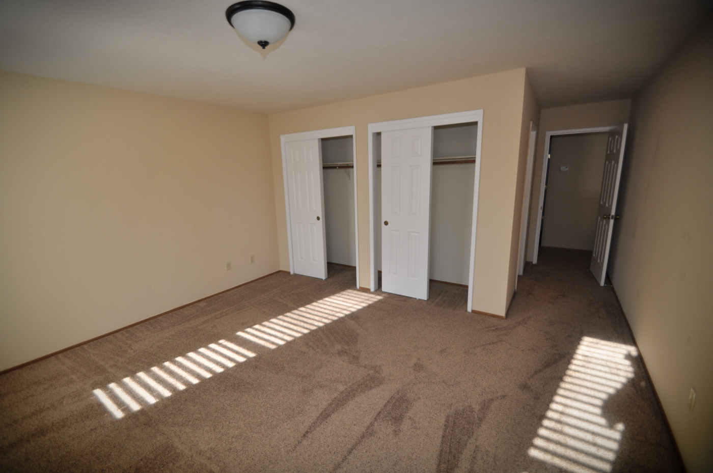 2867 Camulos Way Redding, CA 96002 - Photo 8 of 13 a view of an empty room with wooden floor