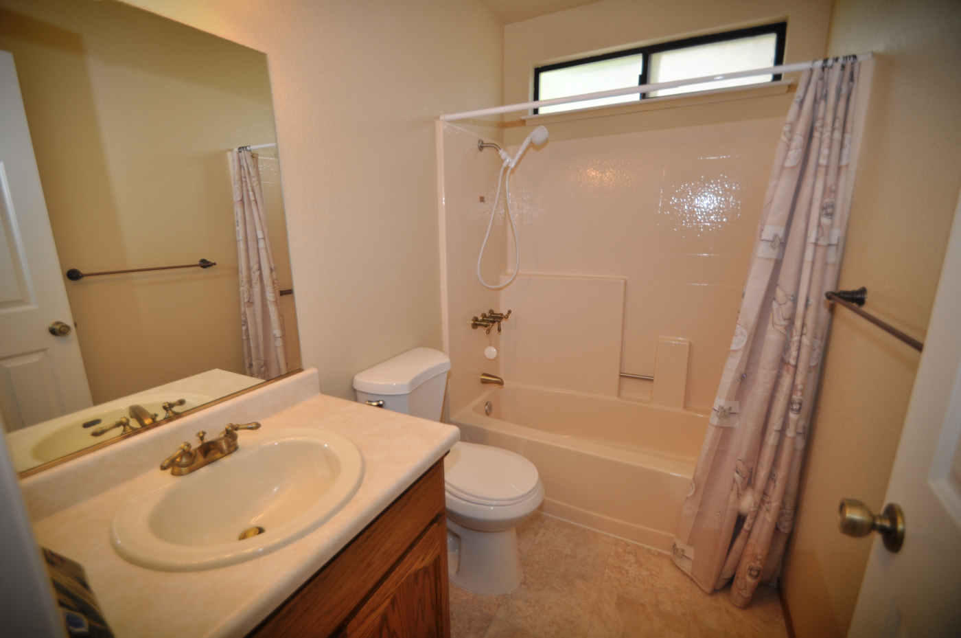 2867 Camulos Way Redding, CA 96002 - Photo 9 of 13 a bathroom with a sink toilet and shower