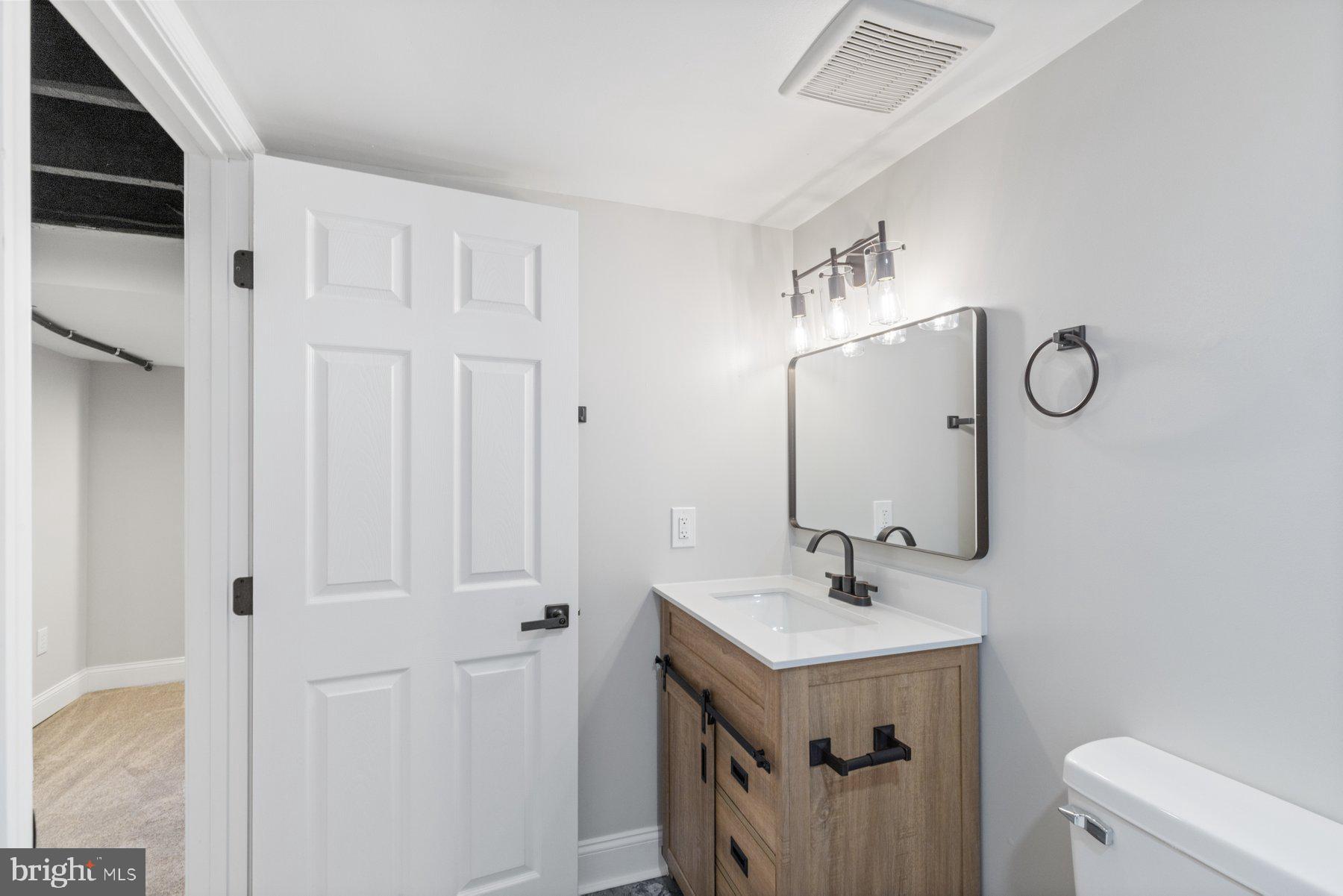 653 Bartlett Avenue Baltimore, MD 21218 - Photo 33 of 39 Lower level full bathroom