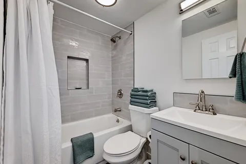 a outdoor space with patio the couches and chairs with wooden floor