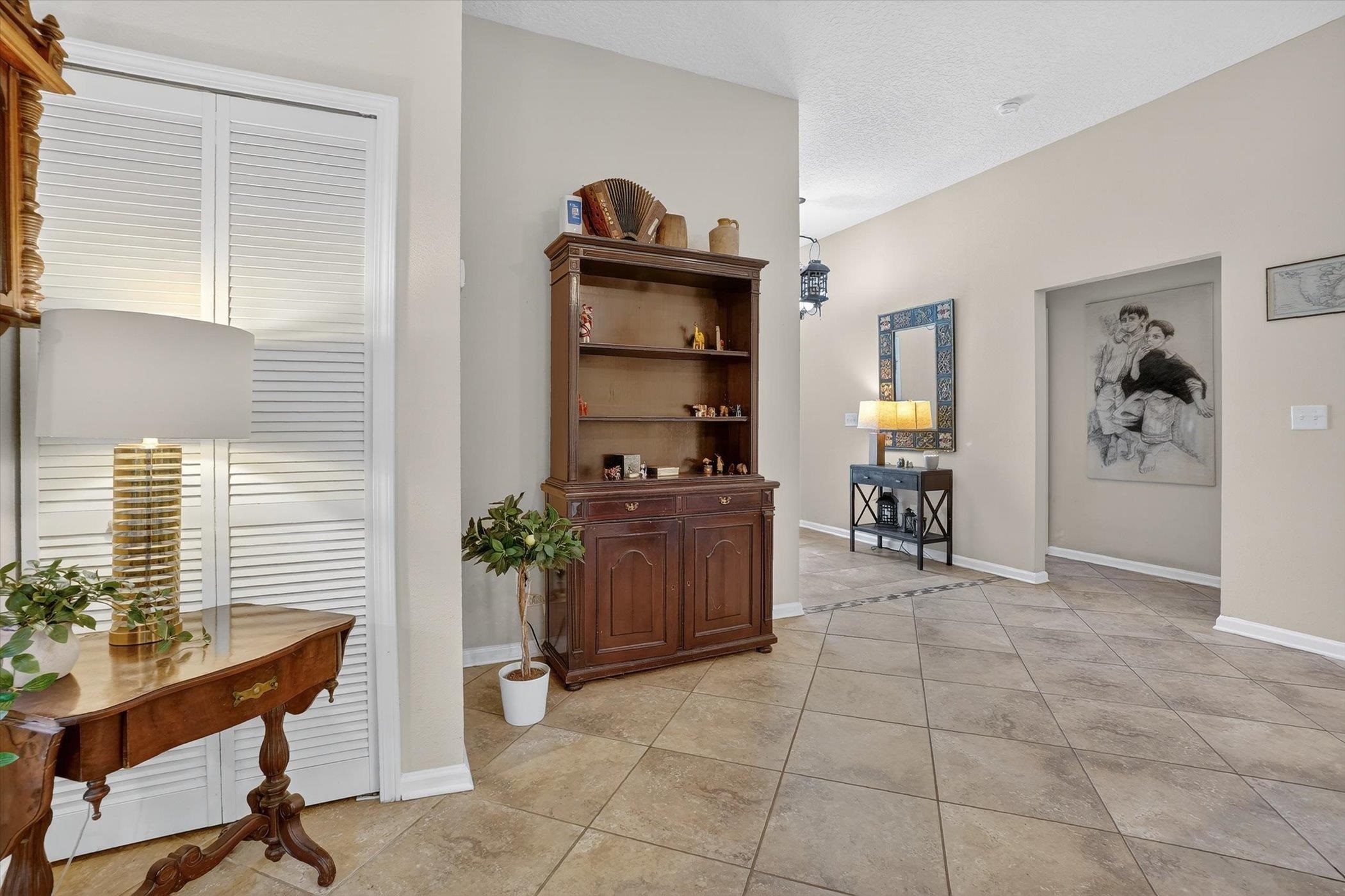 137 Fallen Timber Way St. Augustine, FL 32084 - Photo 14 of 45 Sitting room with baseboards and light tile patterned floors