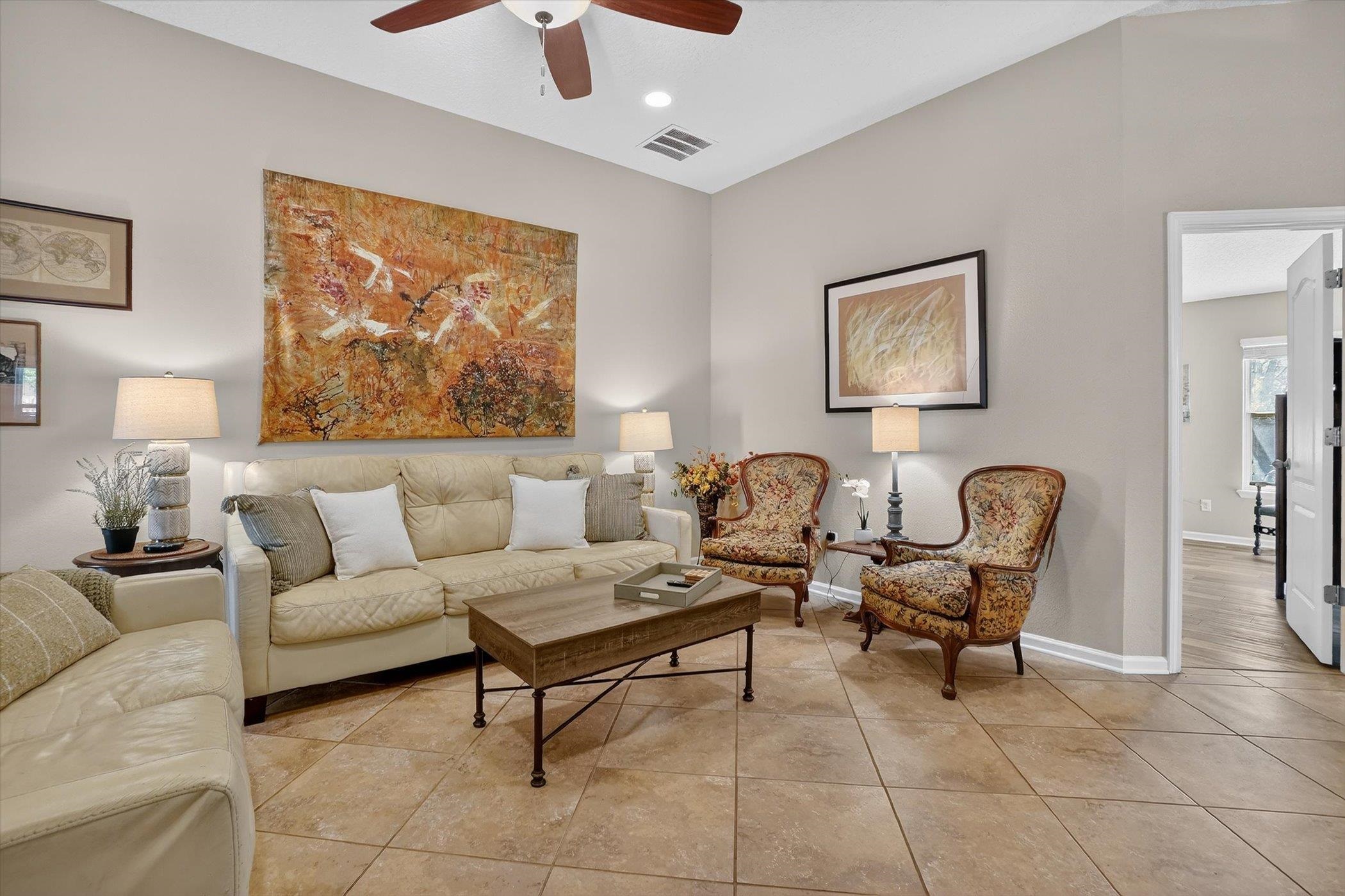 137 Fallen Timber Way St. Augustine, FL 32084 - Photo 3 of 45 Living room with a ceiling fan and light tile patterned flooring