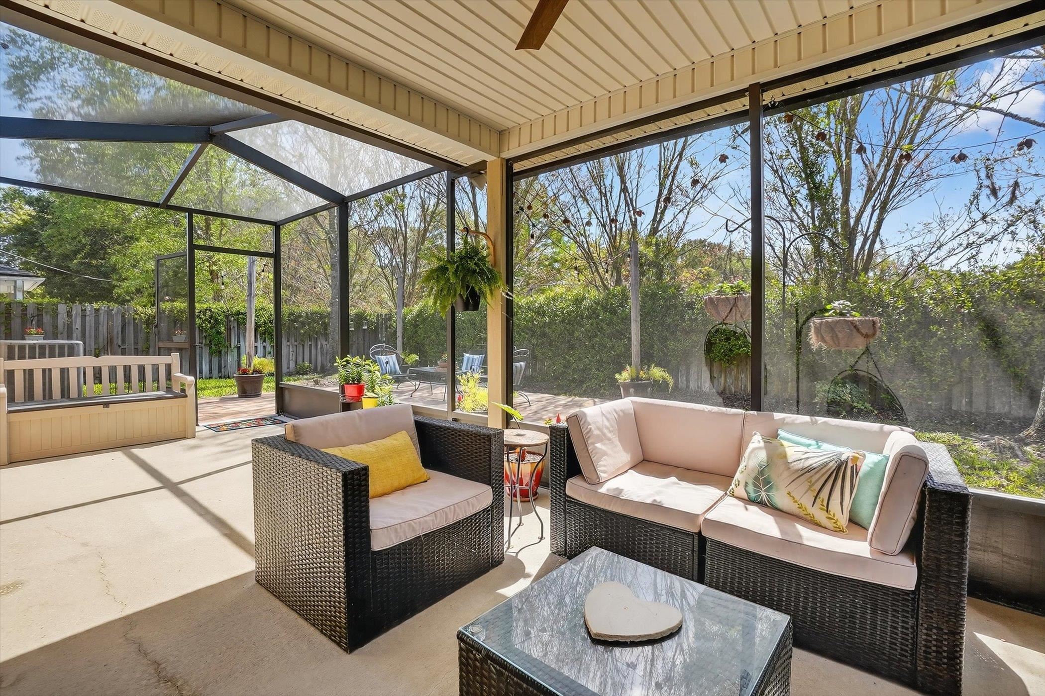 137 Fallen Timber Way St. Augustine, FL 32084 - Photo 37 of 45 Fenced backyard featuring a patio area, an outdoor hangout area, a sunroom, a lanai, and a ceiling fan