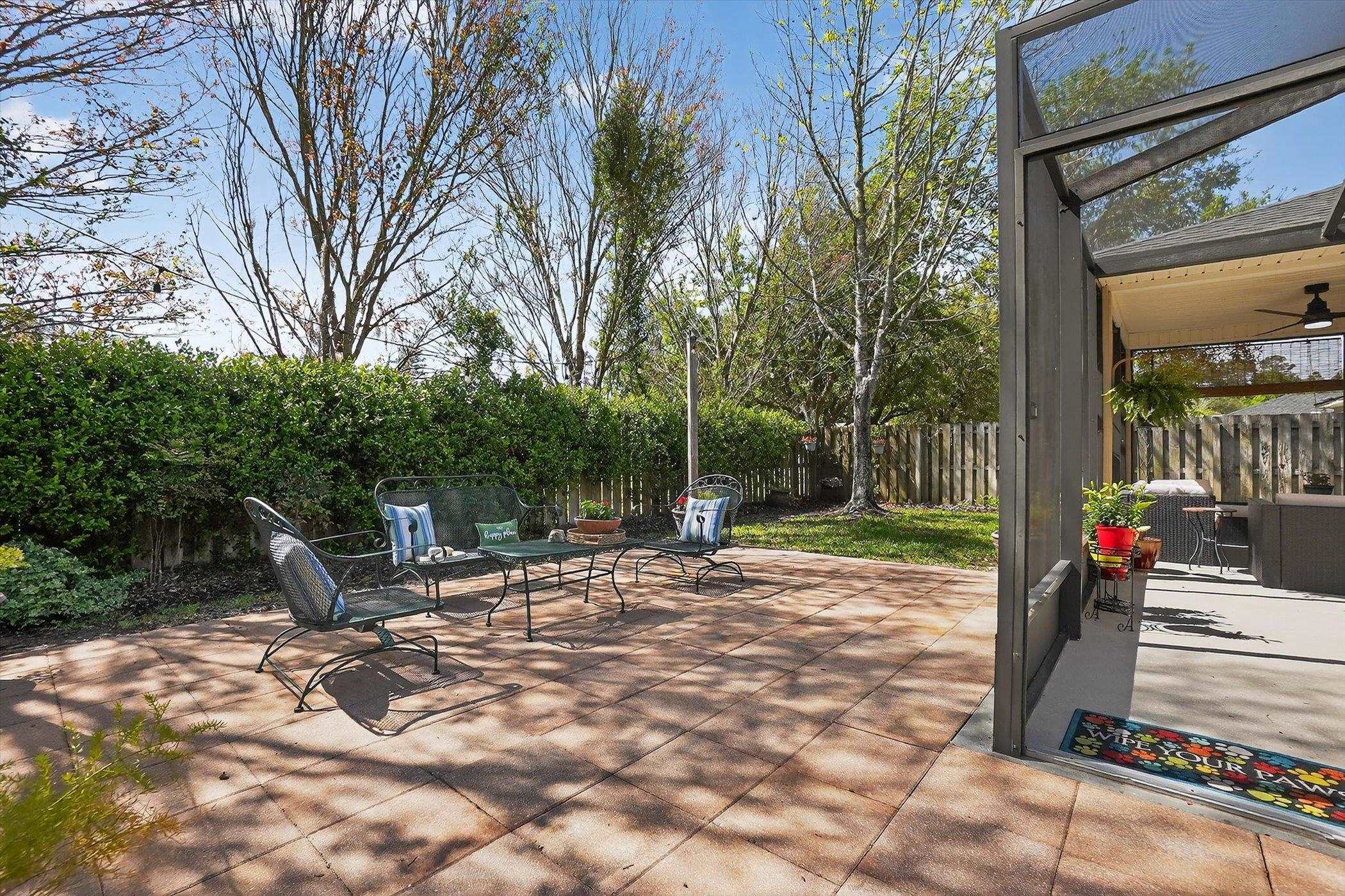137 Fallen Timber Way St. Augustine, FL 32084 - Photo 39 of 45 Wooden deck featuring a patio and a fenced backyard