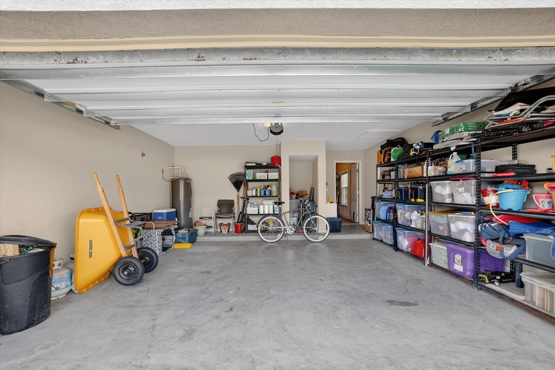 137 Fallen Timber Way St. Augustine, FL 32084 - Photo 45 of 45 Garage featuring electric water heater