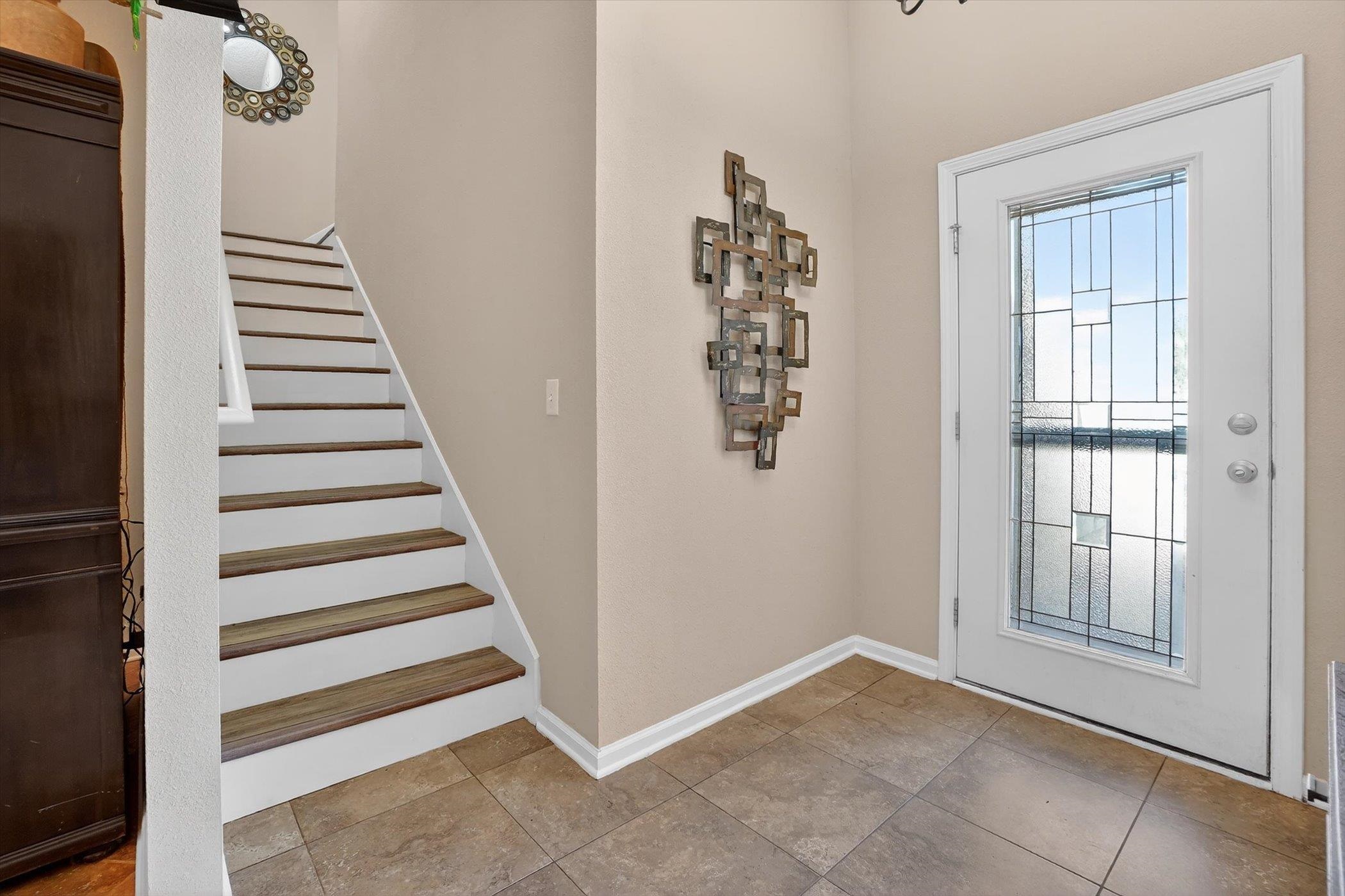 137 Fallen Timber Way St. Augustine, FL 32084 - Photo 8 of 45 Doorway featuring baseboards and stairs