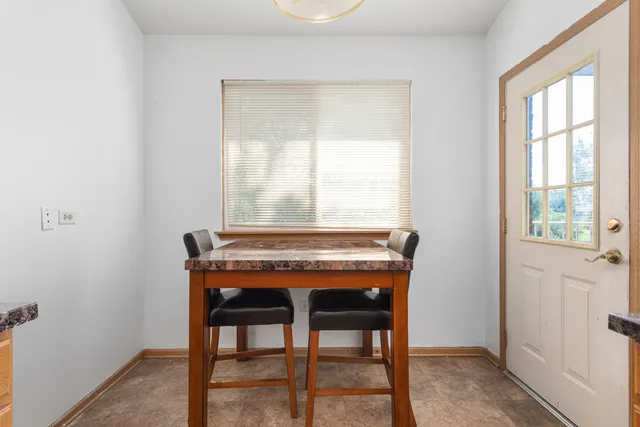 a room that has a table and chair