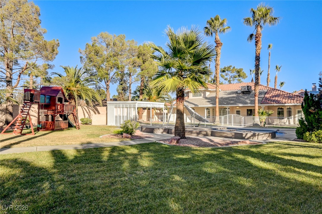 2955 El Camino Road Las Vegas, NV 89146 - Photo 93 of 99 View of yard featuring a playground and a patio