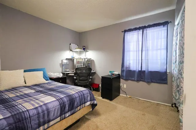 a room with furniture and a window