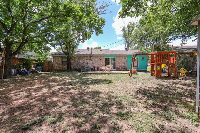 front view of house with a yard