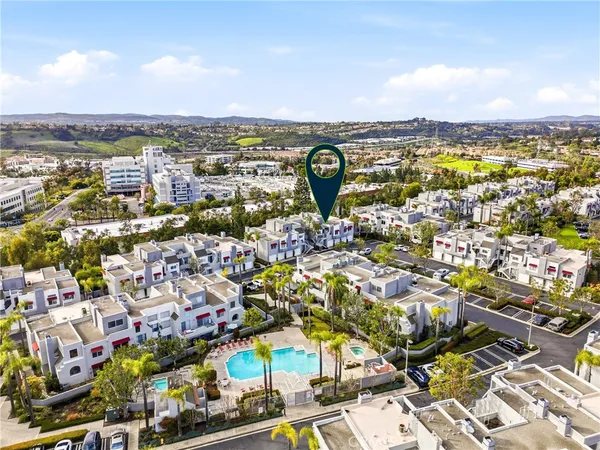 an aerial view of a city with lots of residential buildings