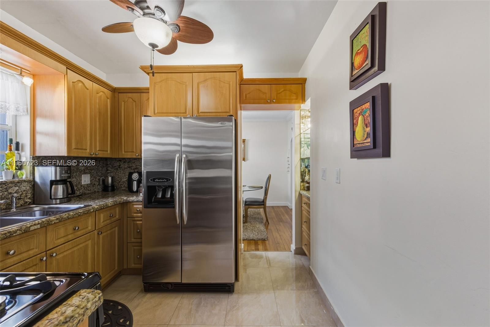 Surfside Surfside, FL 33154 - Photo 17 of 42 a kitchen with a refrigerator and a sink