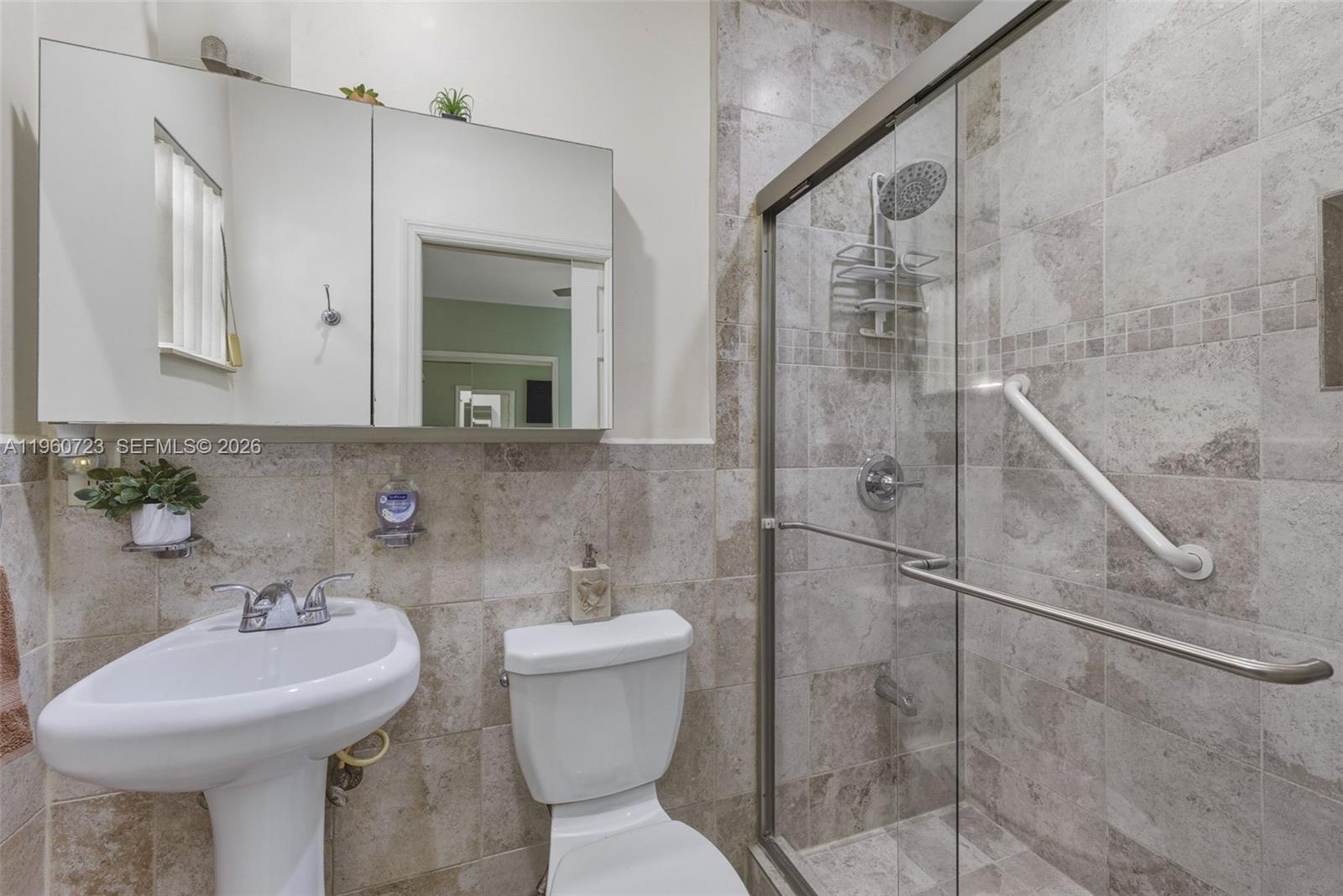 Surfside Surfside, FL 33154 - Photo 21 of 42 a bathroom with a sink toilet and shower