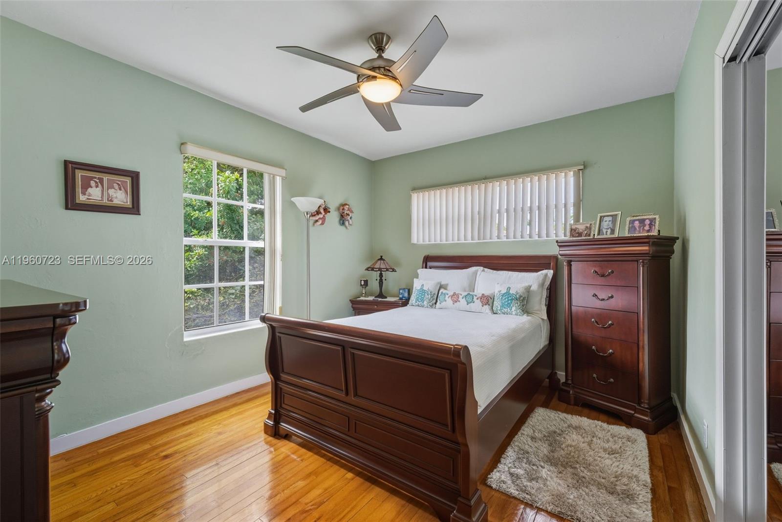 Surfside Surfside, FL 33154 - Photo 25 of 42 a bedroom with a bed and a window