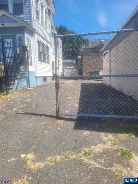 1075 Bergen Street Newark, NJ 07112 - Photo 2 of 2 a view of a backyard of a house