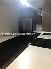 a black and white photo of a cabinet