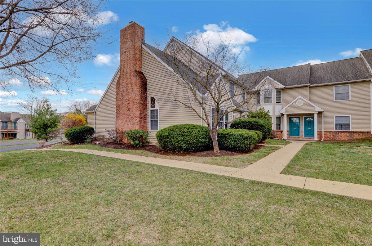 101 Heather Lane Reading, PA 19610 - Photo 2 of 38 a front view of a house with garden