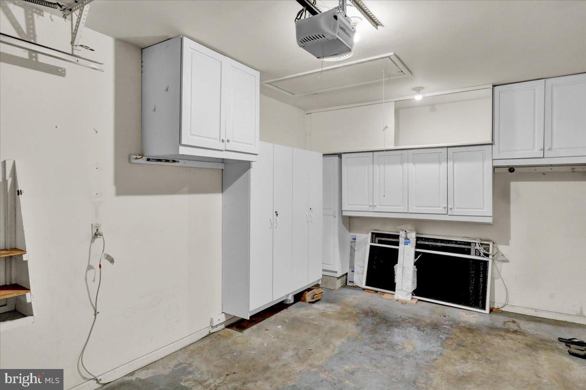 101 Heather Lane Reading, PA 19610 - Photo 36 of 38 a view of an empty room with a fireplace and a ceiling fan