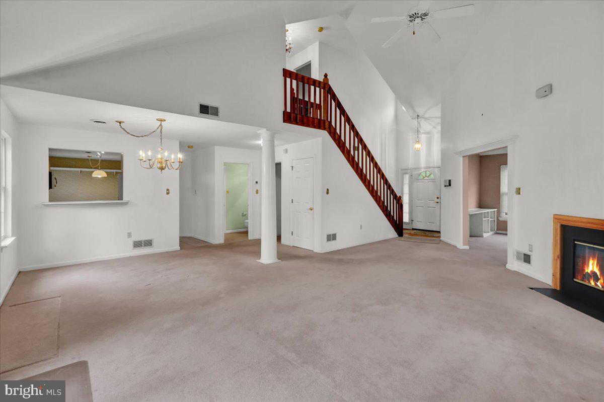 101 Heather Lane Reading, PA 19610 - Photo 8 of 38 a view of a livingroom with staircase ceiling fan and stairs