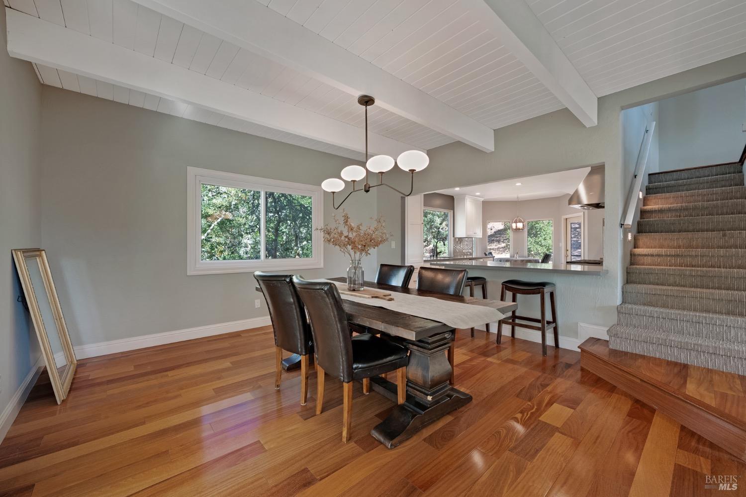 4727 Woodview Drive Santa Rosa, CA 95405 - Photo 25 of 46 a view of a dining room with furniture window and wooden floor