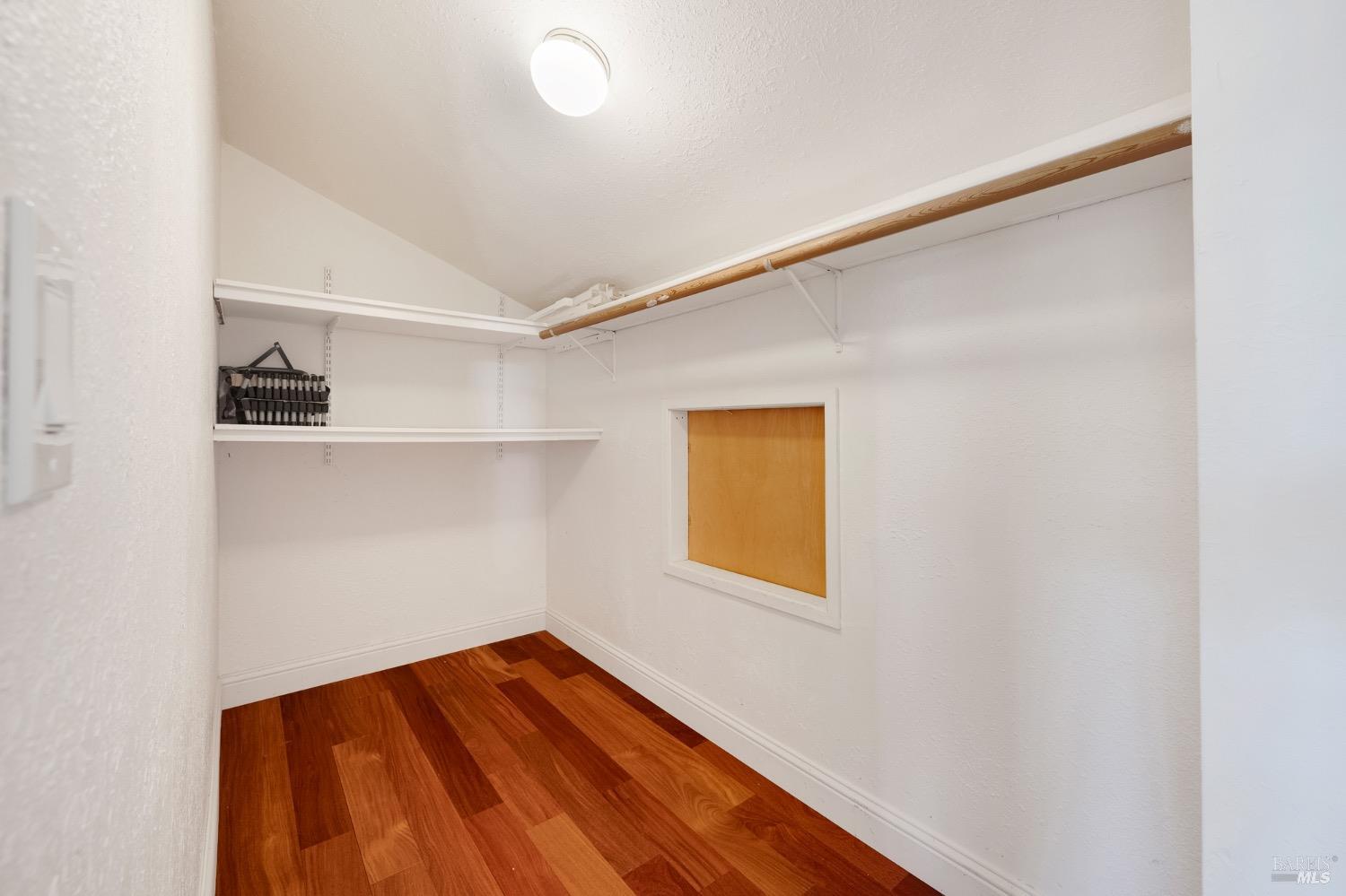 4727 Woodview Drive Santa Rosa, CA 95405 - Photo 41 of 46 a view of a room with wooden floor and a window
