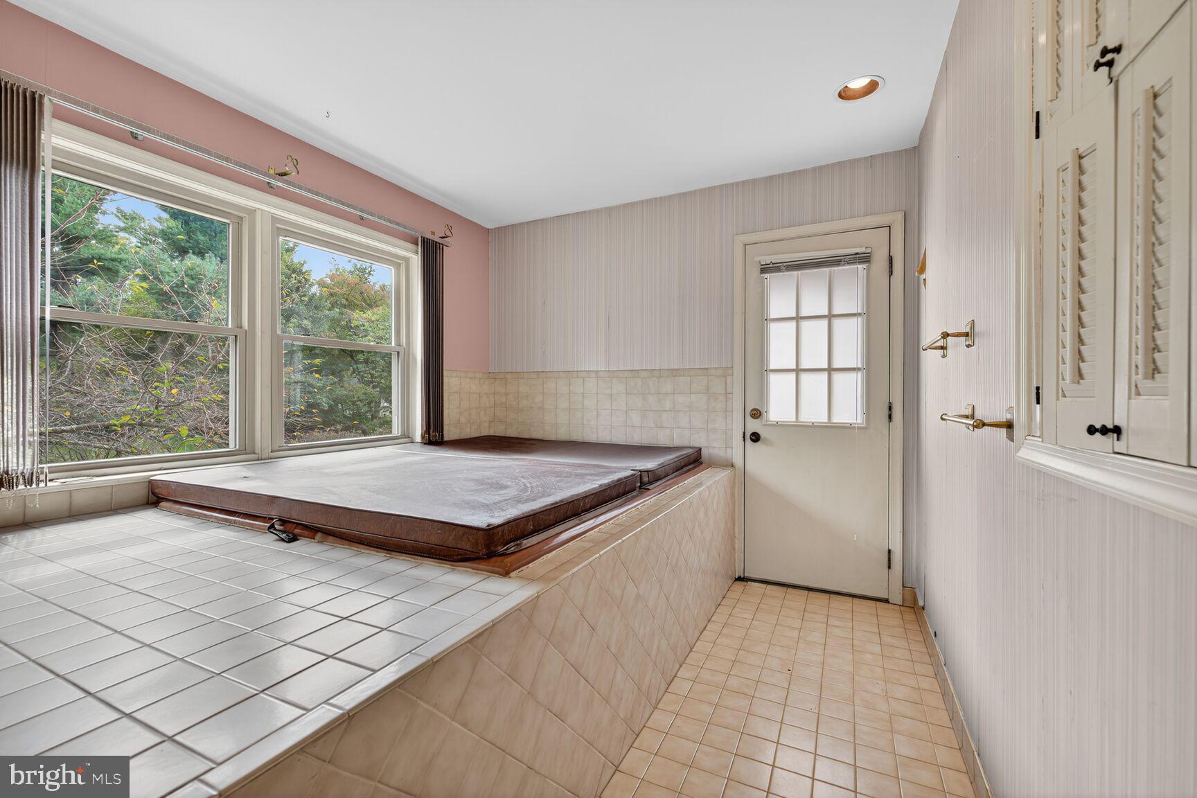 12512 West Old Baltimore Road Boyds, MD 20841 - Photo 12 of 32 Jacuzzi - door to deck