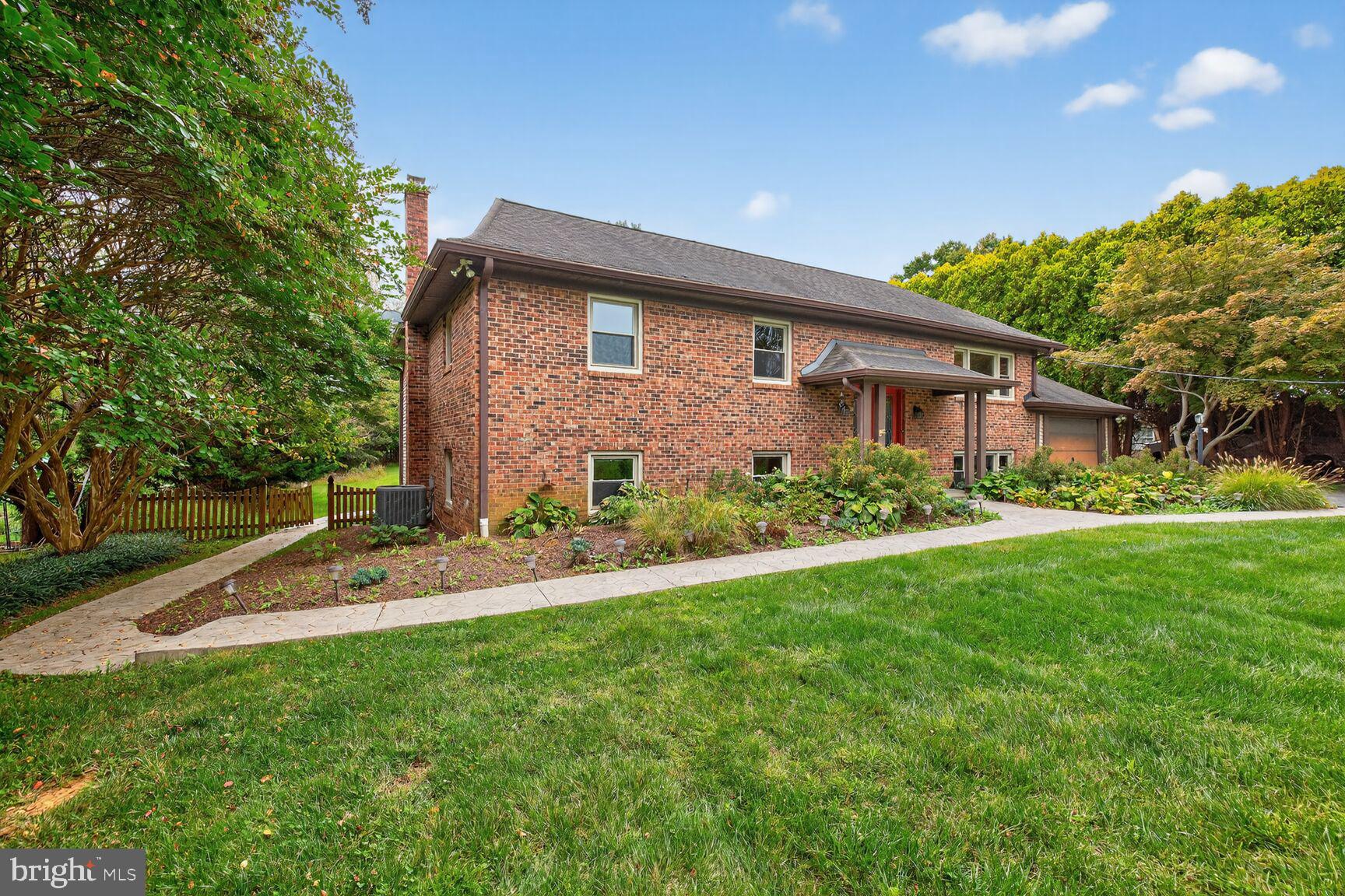 12512 West Old Baltimore Road Boyds, MD 20841 - Photo 2 of 32 Nice front lawn and side yards
