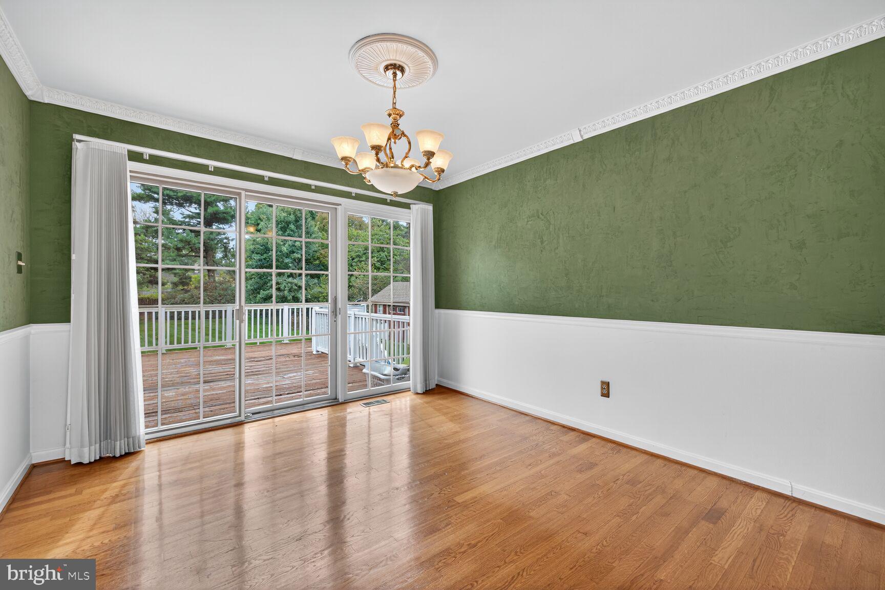 12512 West Old Baltimore Road Boyds, MD 20841 - Photo 7 of 32 Sliding doors to back deck