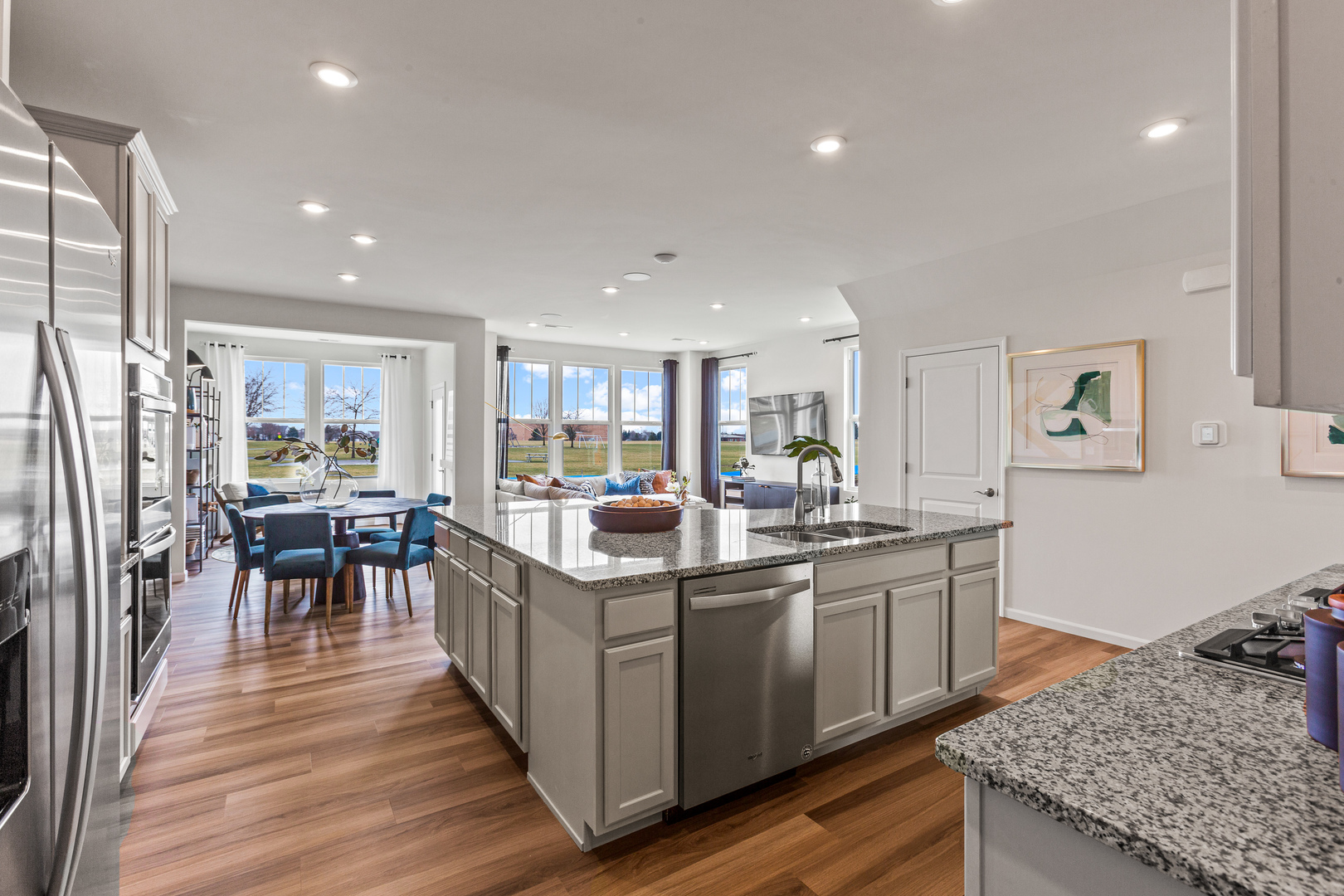 2206 Weatherbee Lane Naperville, IL 60563 - Photo 11 of 19 a kitchen with lots of counter top space and living room