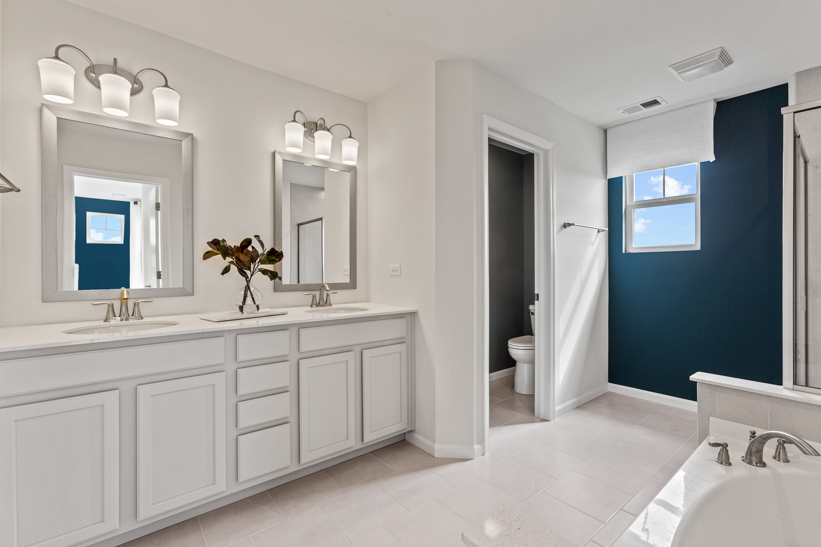 2206 Weatherbee Lane Naperville, IL 60563 - Photo 14 of 19 a spacious bathroom with a double vanity sink and a mirror