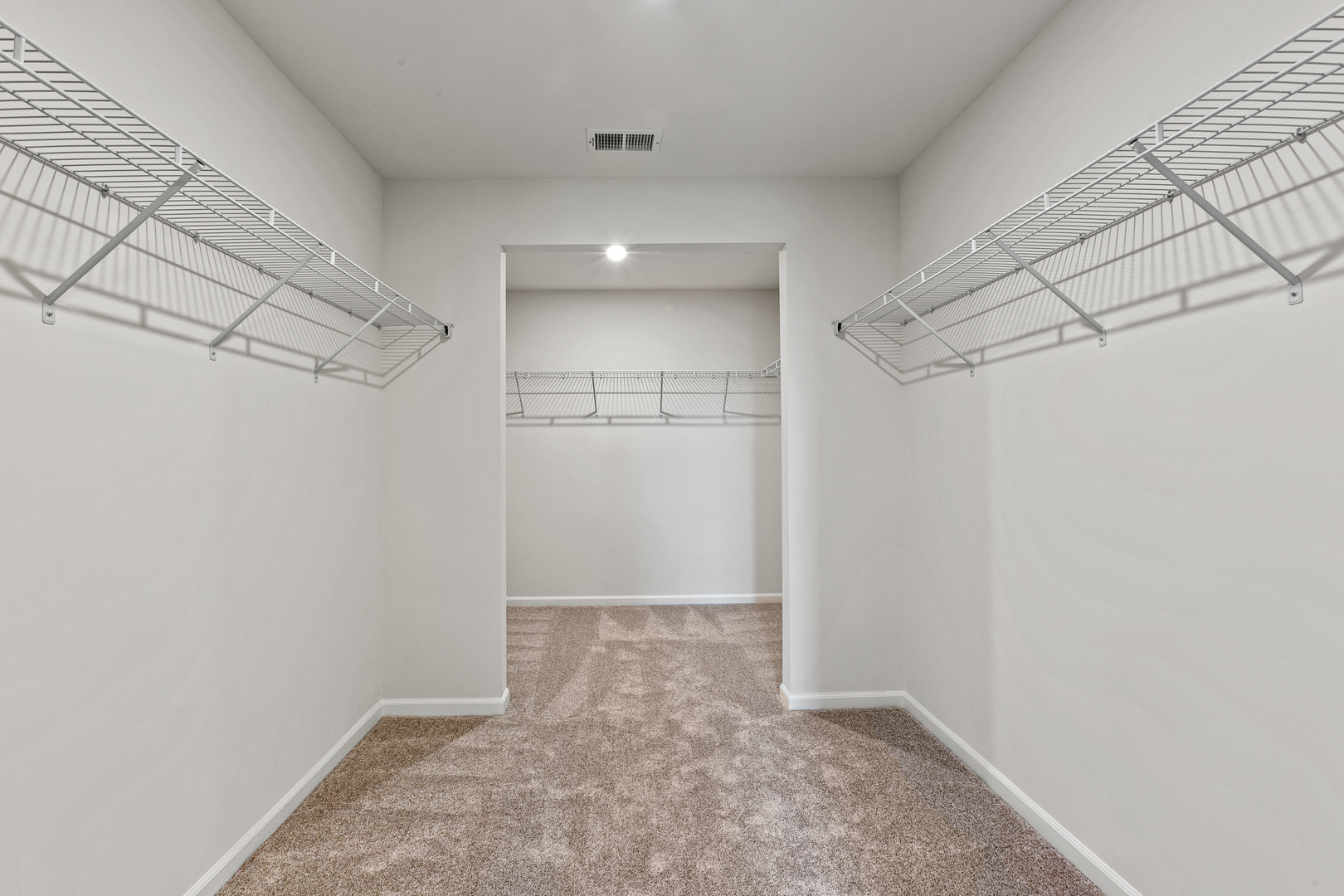 2206 Weatherbee Lane Naperville, IL 60563 - Photo 16 of 19 a view of a room with racks on the wall