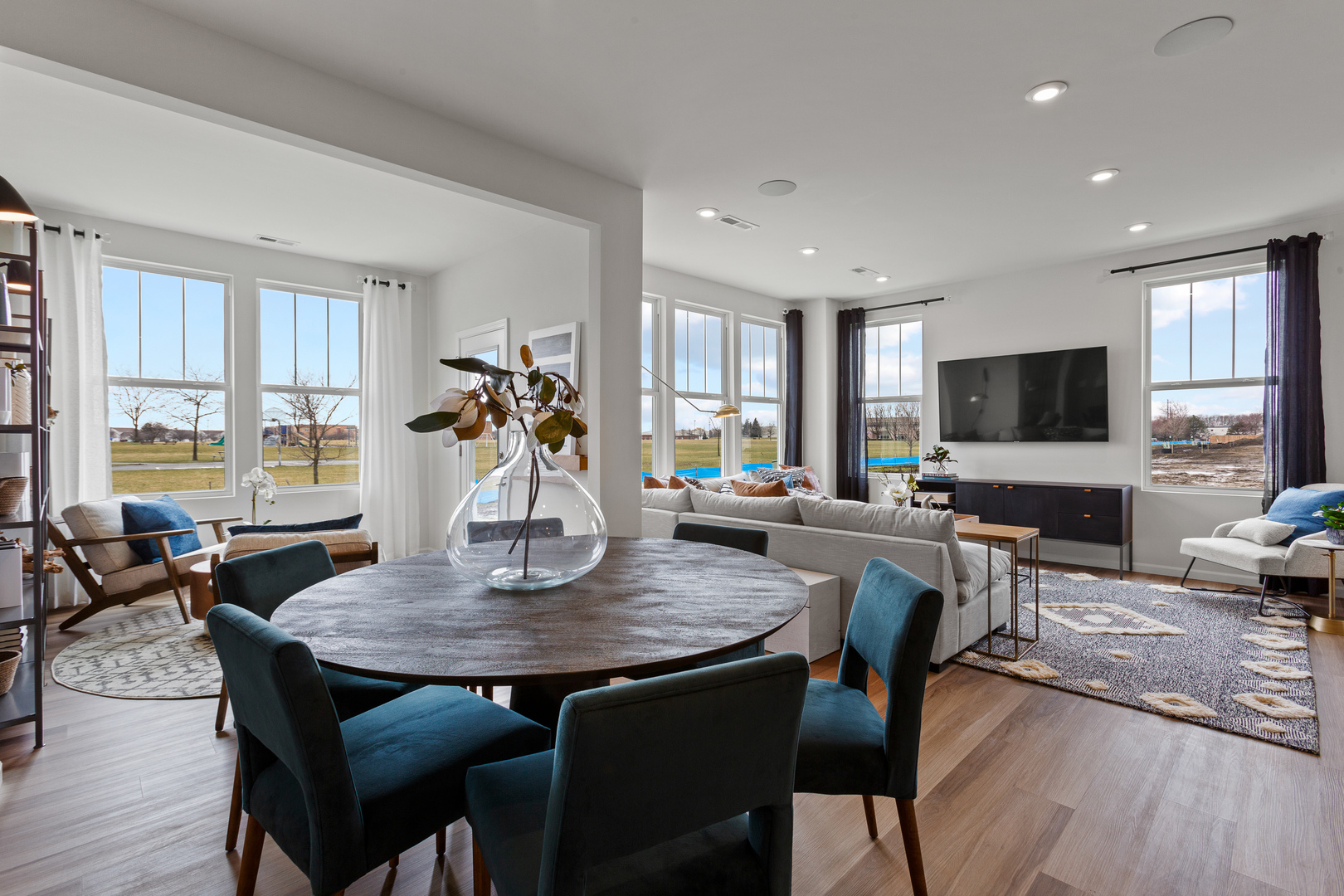 2206 Weatherbee Lane Naperville, IL 60563 - Photo 5 of 19 a view of a dining room with furniture window and wooden floor