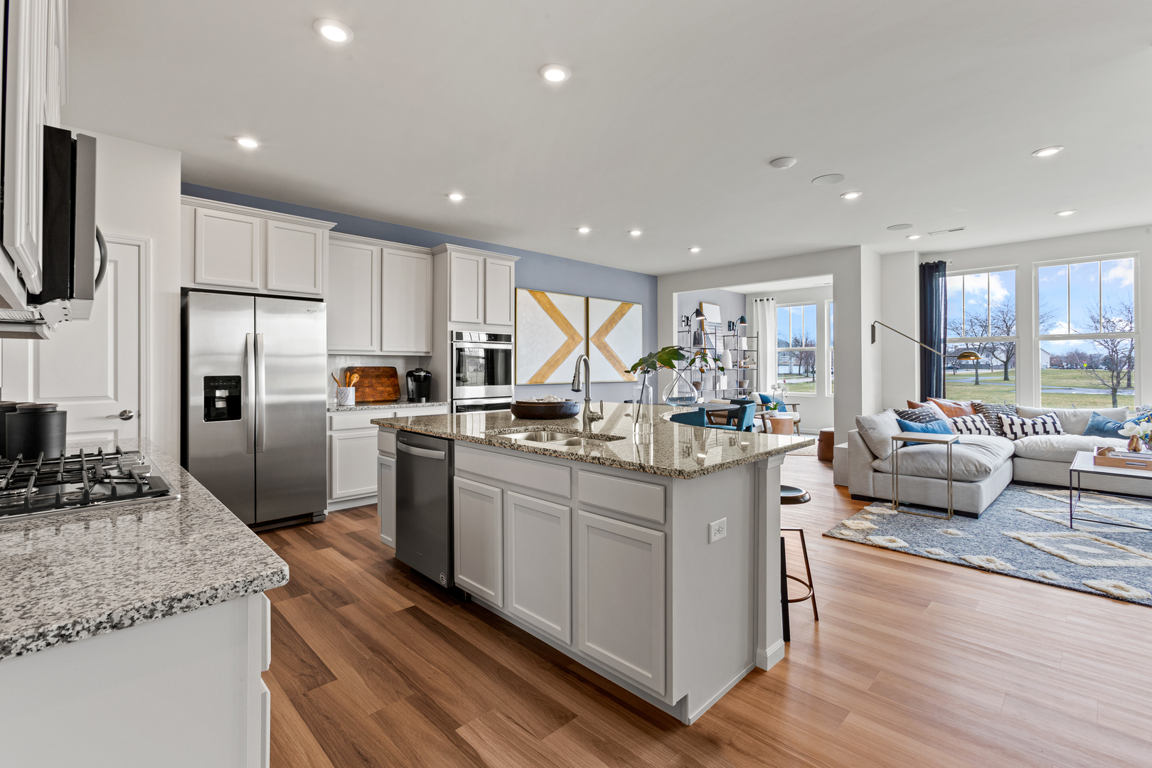 2206 Weatherbee Lane Naperville, IL 60563 - Photo 10 of 19 a kitchen with stainless steel appliances granite countertop a refrigerator stove microwave and sink