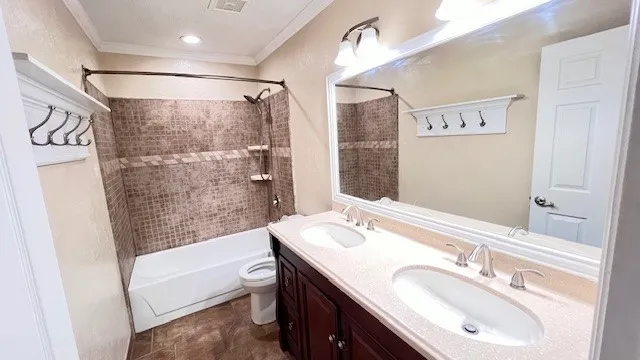 a bathroom with a granite countertop sink a mirror a shower and a bathtub