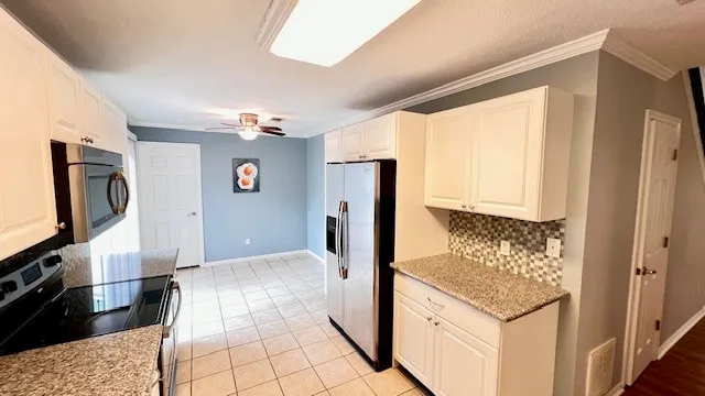 a bathroom with a double vanity sink and mirror