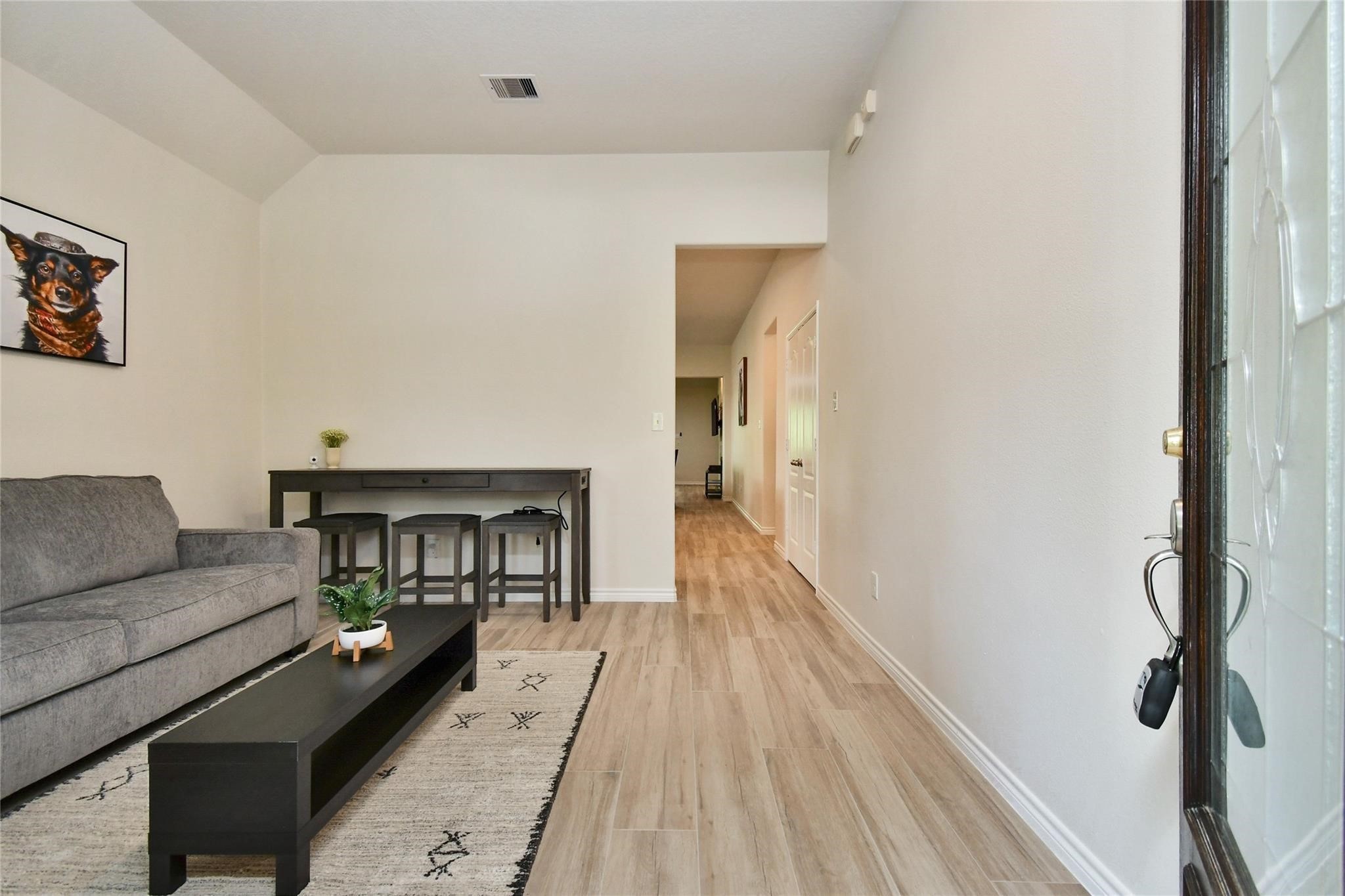 22 Wood Drake Place Tomball, TX 77375 - Photo 7 of 21 a living room with furniture and a wooden floor
