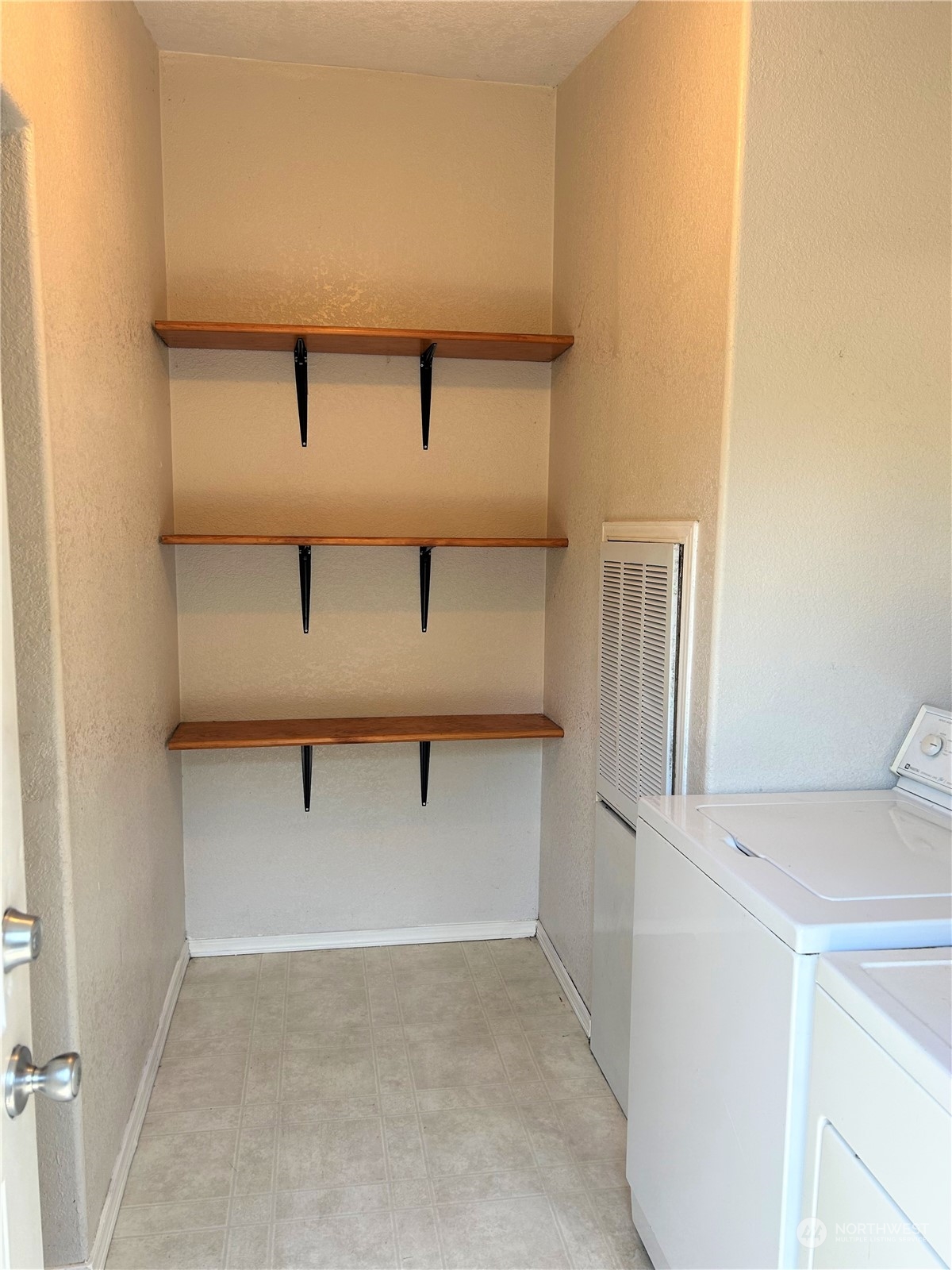 8145 183rd Avenue Southwest Rochester, WA 98579 - Photo 12 of 33 a view of walk in closet with empty racks