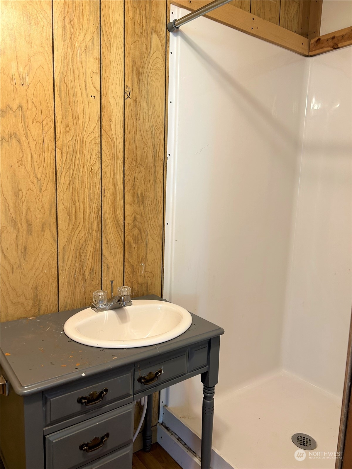 8145 183rd Avenue Southwest Rochester, WA 98579 - Photo 25 of 33 a bathroom with a sink and a mirror