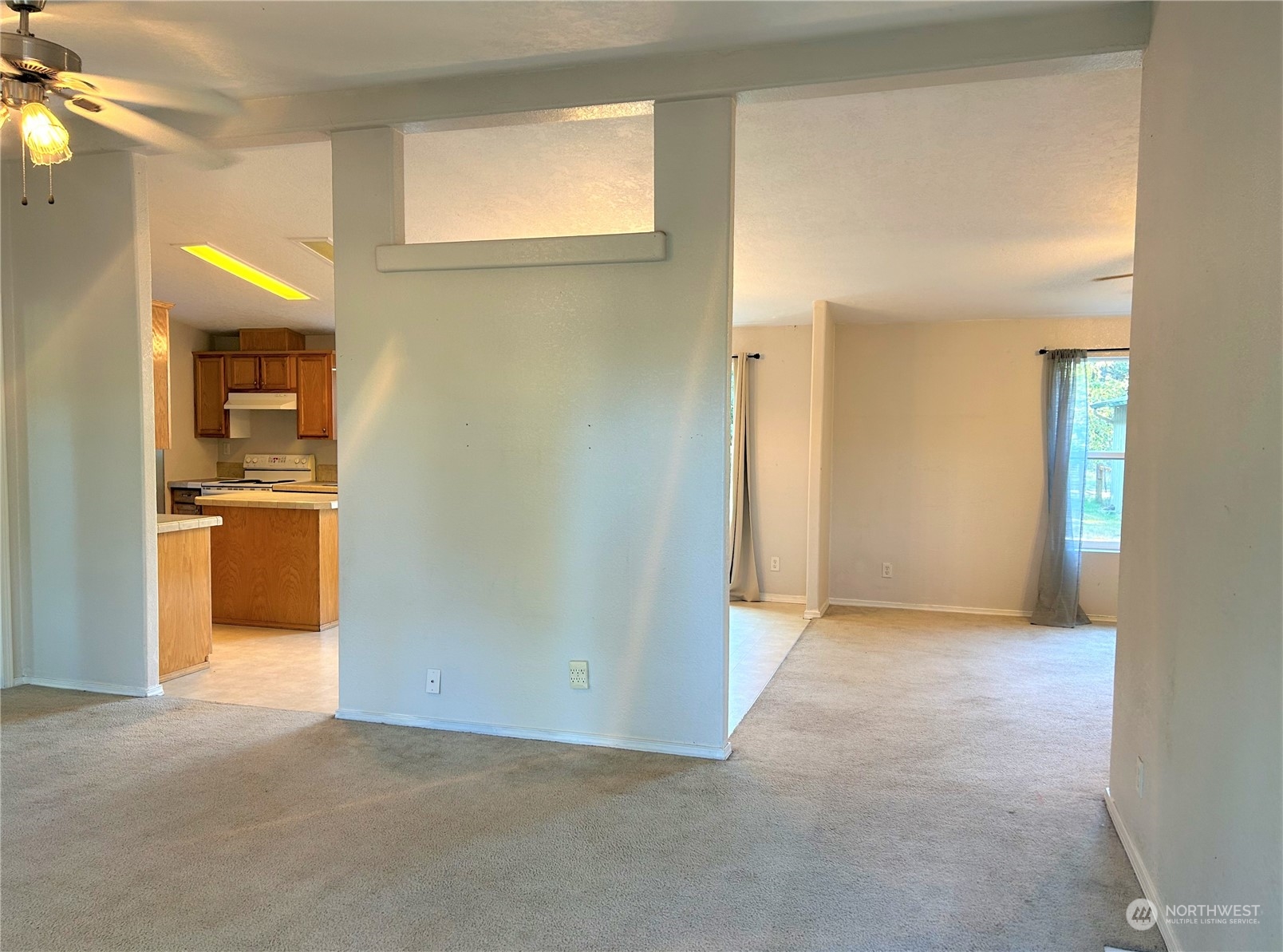 8145 183rd Avenue Southwest Rochester, WA 98579 - Photo 10 of 33 a view of a kitchen cabinets and wooden floor